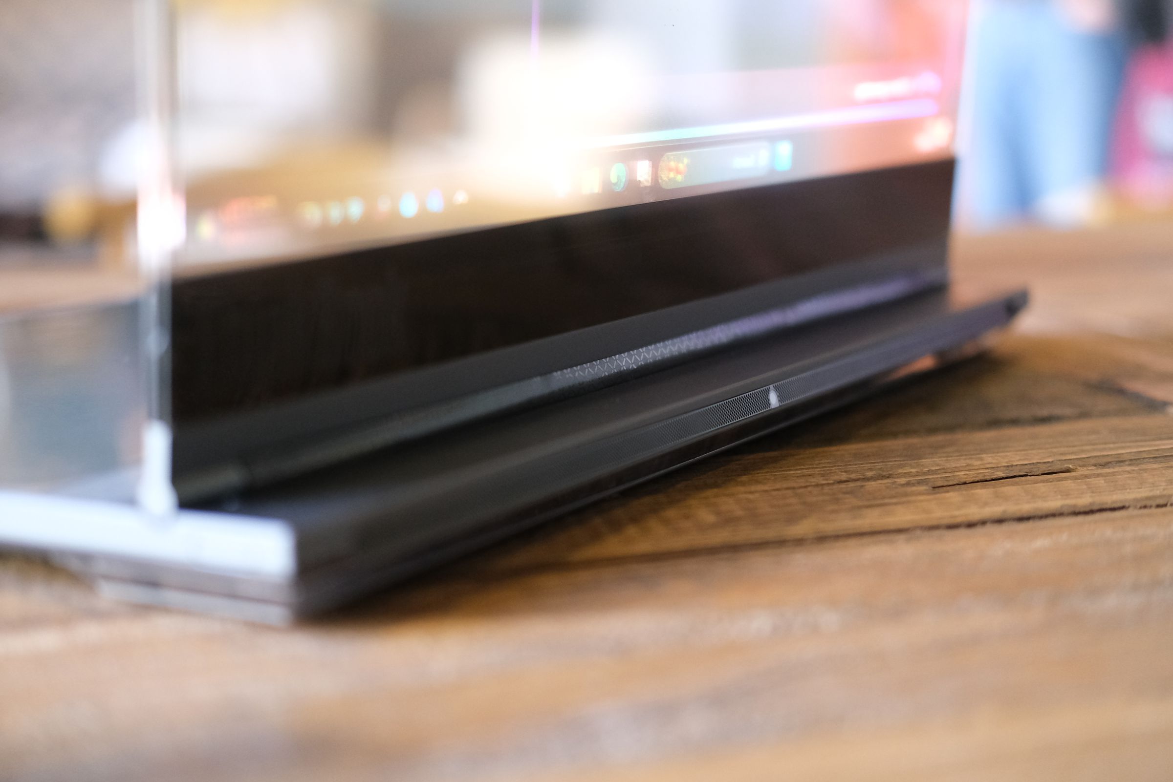 Close up of back base of Lenovo laptop showing small camera.