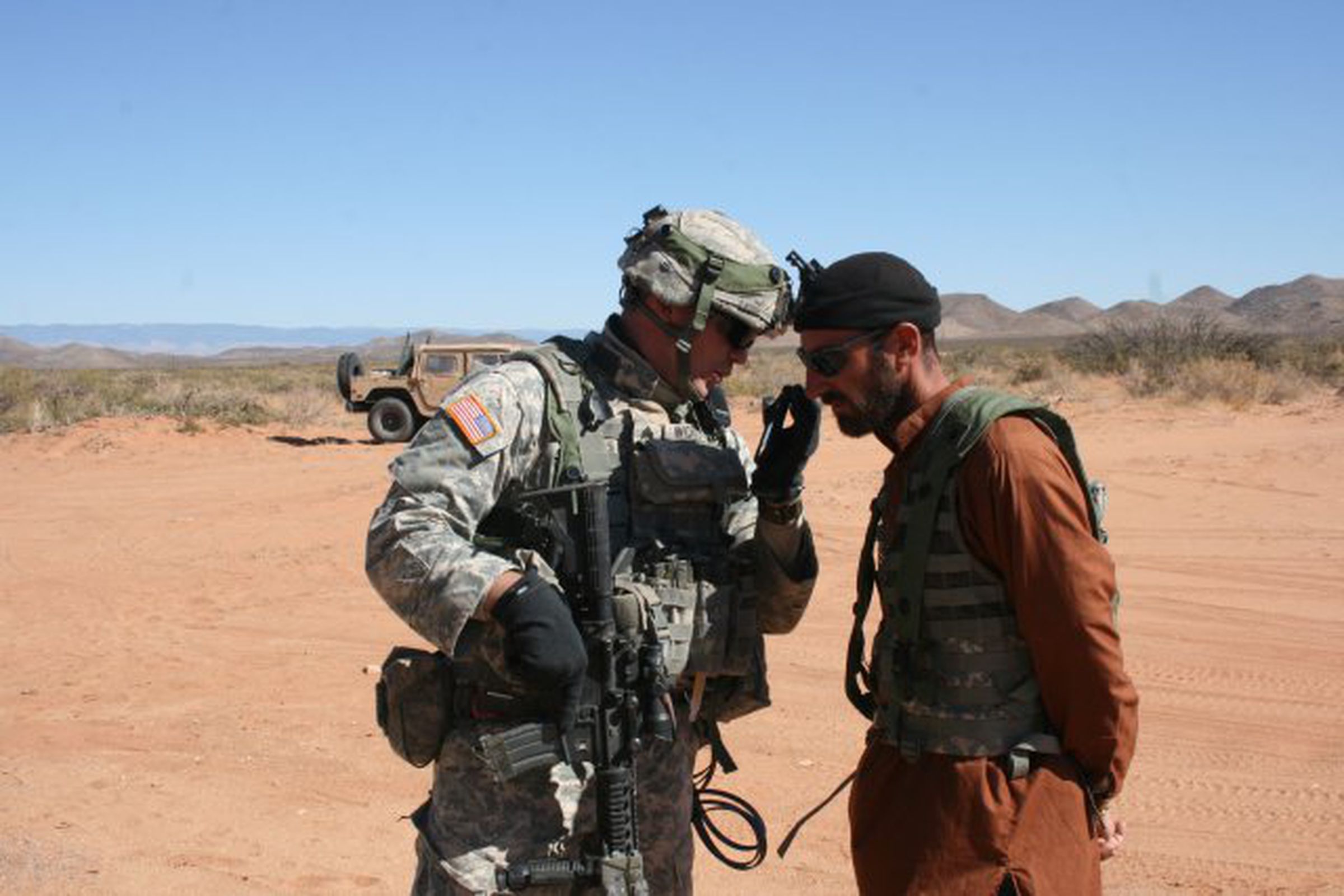 Army soldiers using cell phone