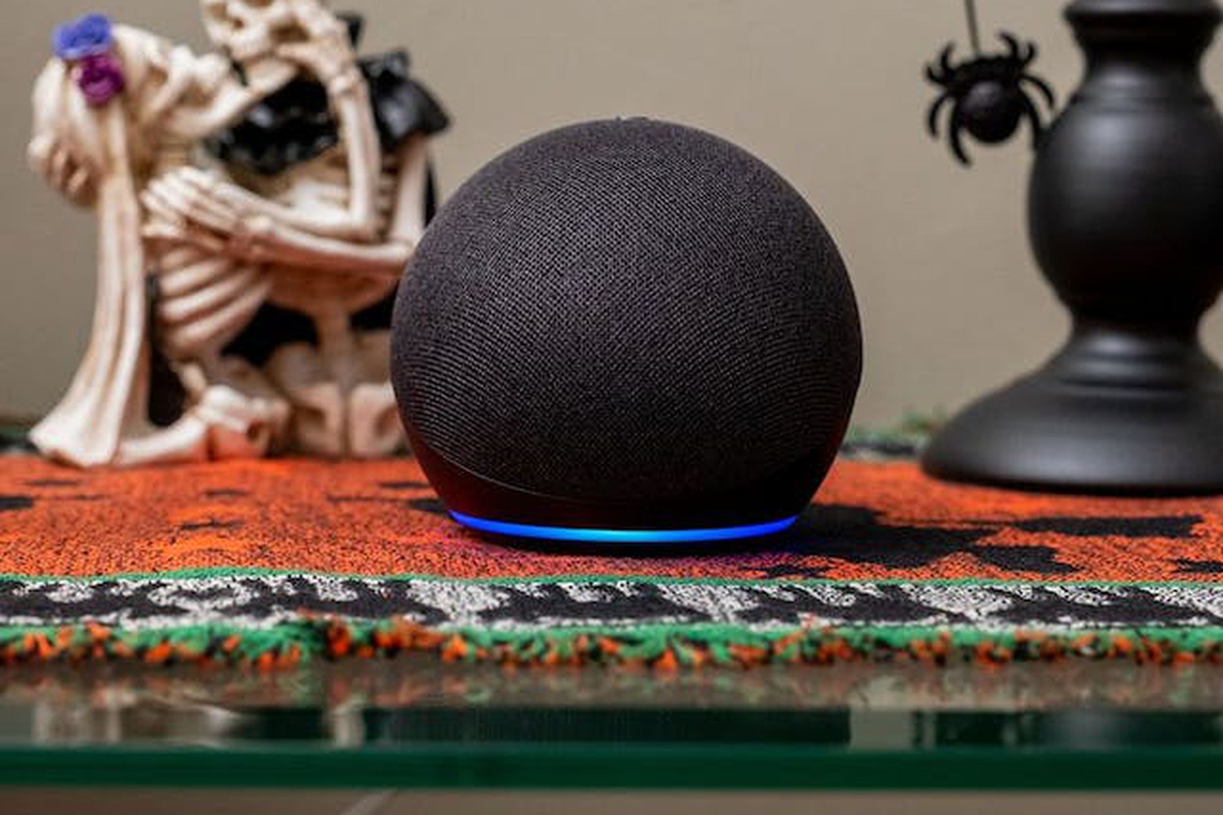 The fourth-gen Echo Dot sitting on a table.