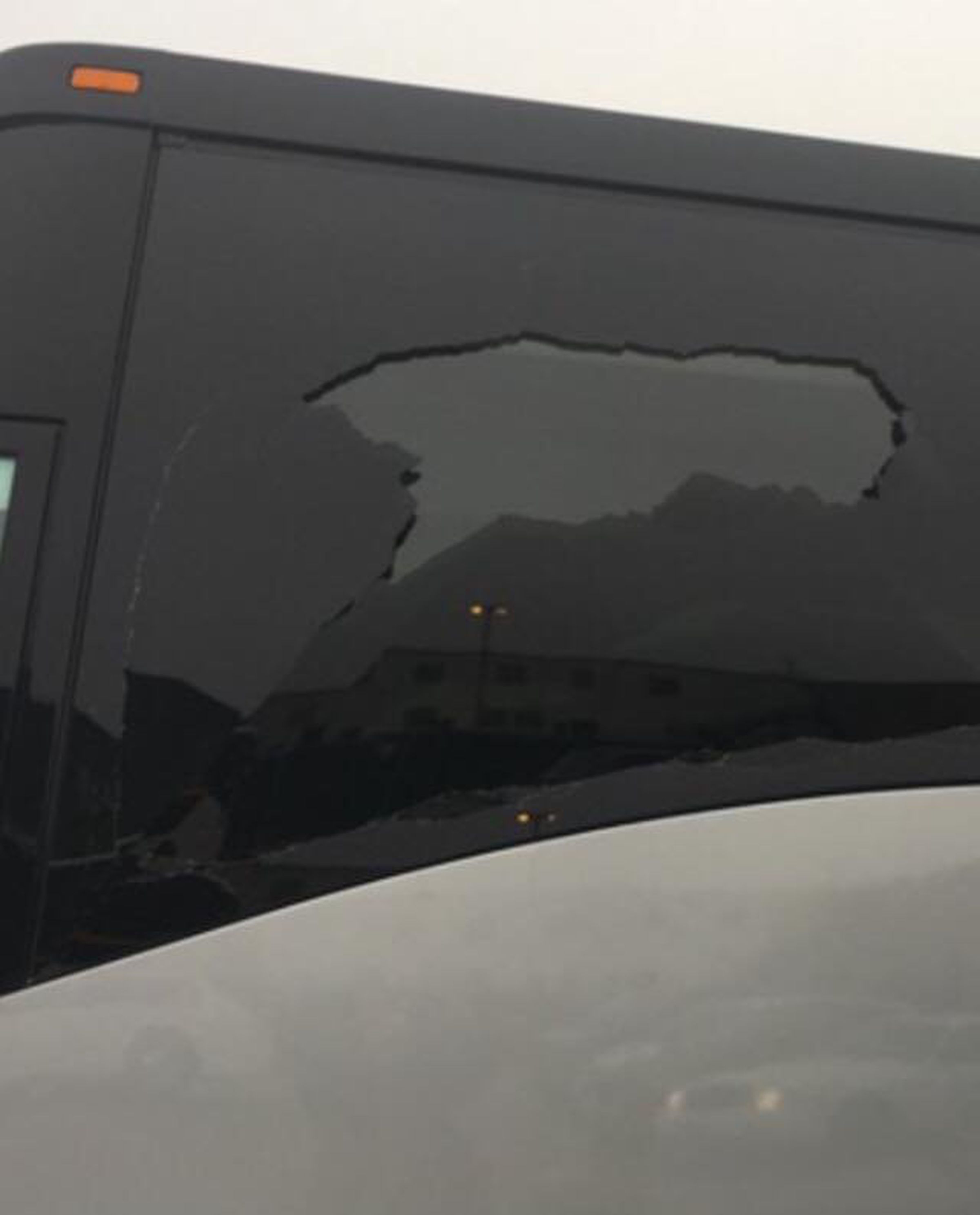 Damage to a company bus from a BB gun