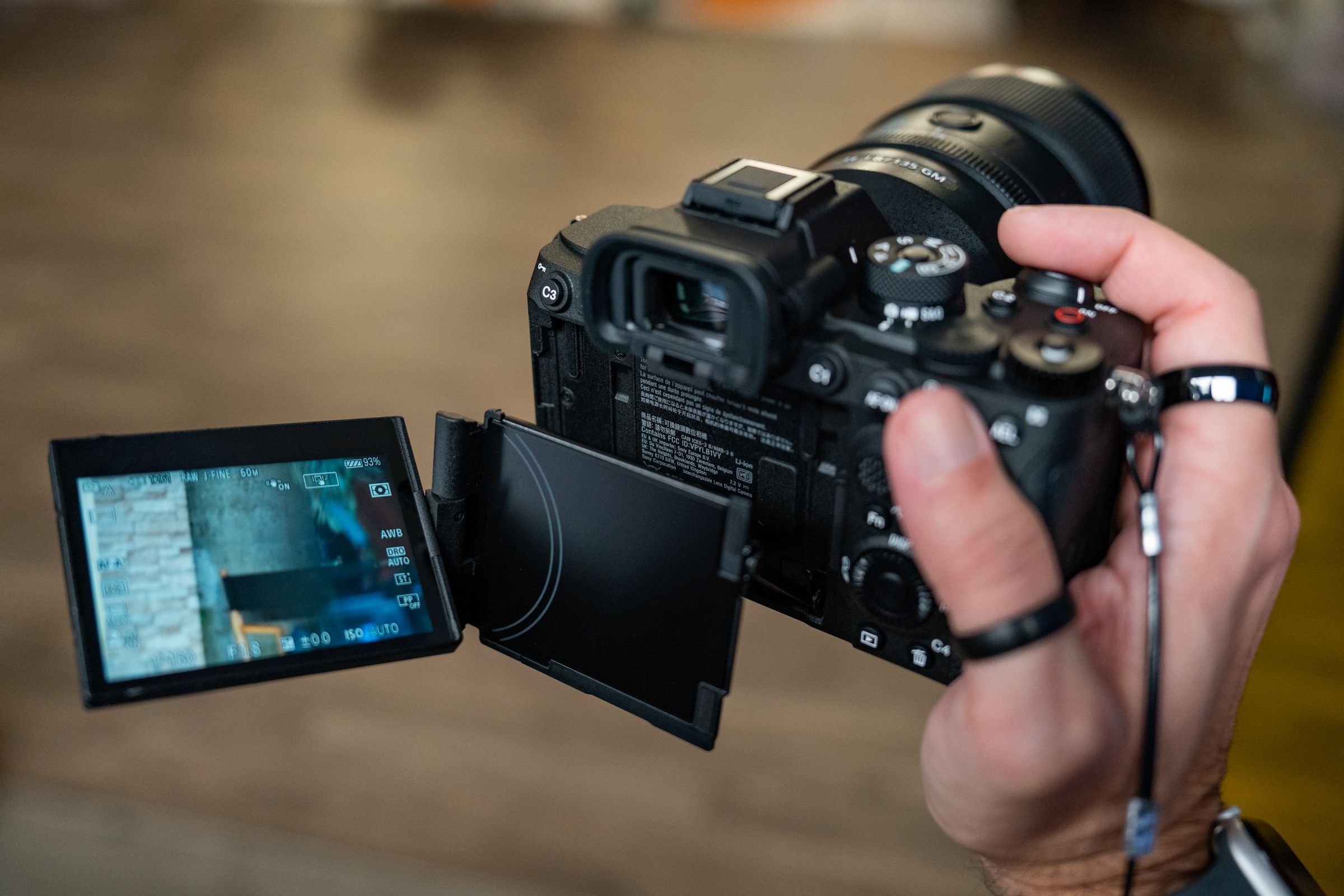 The rear display swings out and swivels like many other cameras but also tilts down or up. It allows for many more angles of use, and is much faster to deploy to quickly shoot from the hip or above your head when compared to models that only unfold to the left.