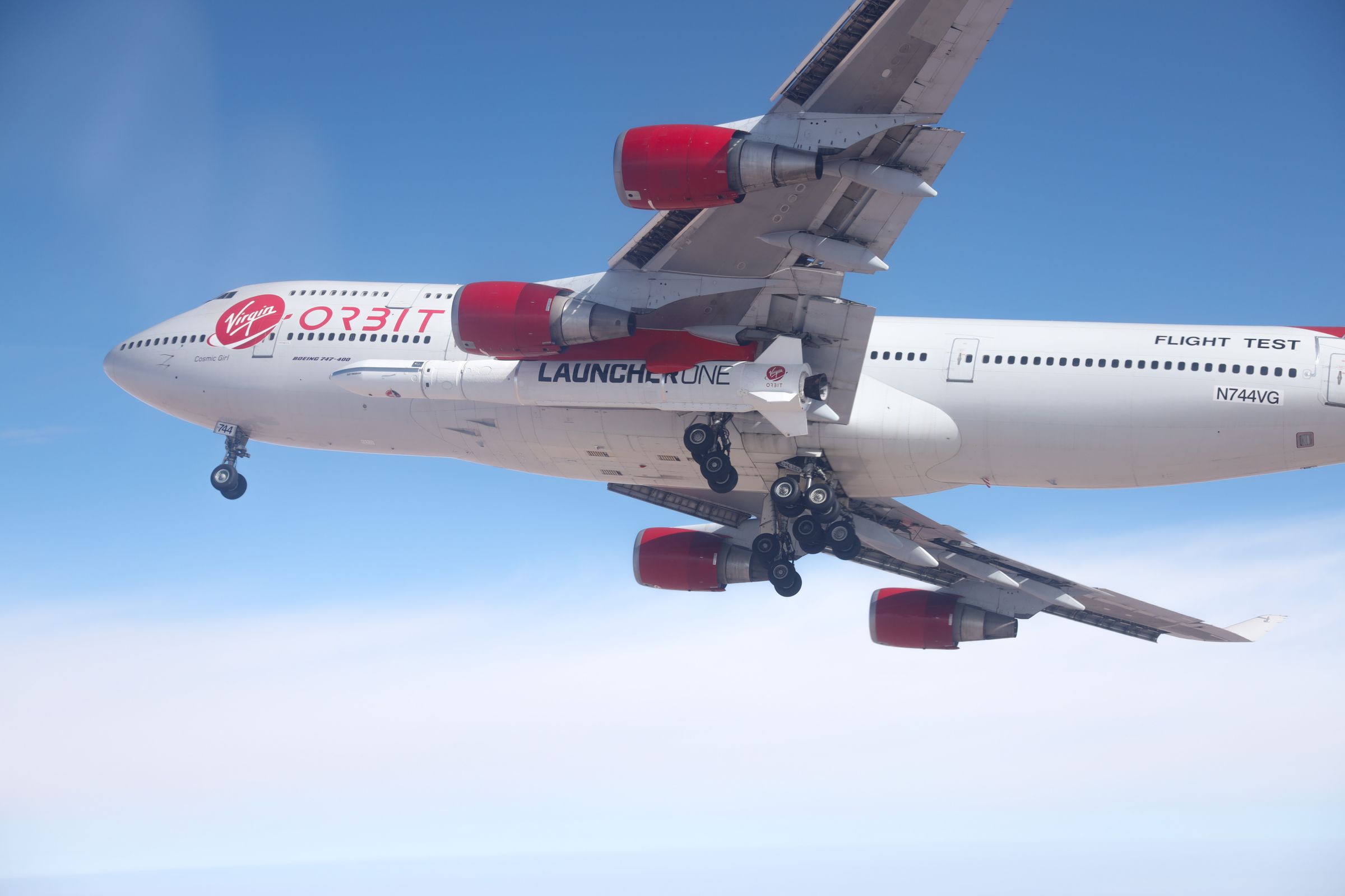 Virgin Orbit’s Cosmic Girl carrying a LauncherOne rocket underneath its wing during Sunday’s test.
