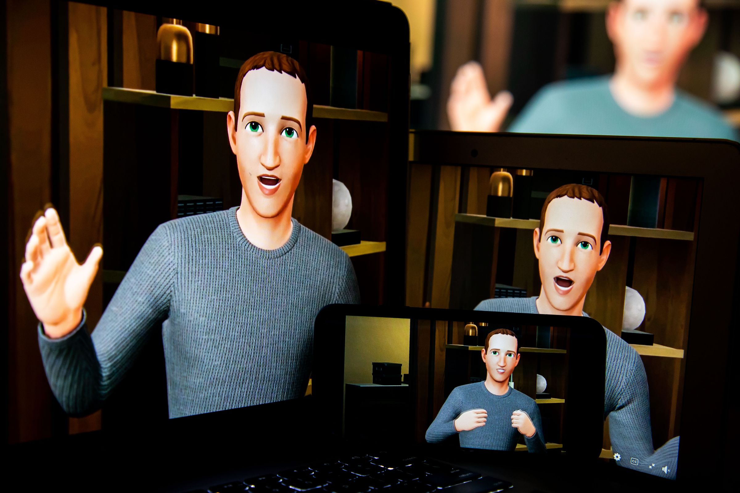 Image of Mark Zuckerberg’s VR avatar on a screen waving
