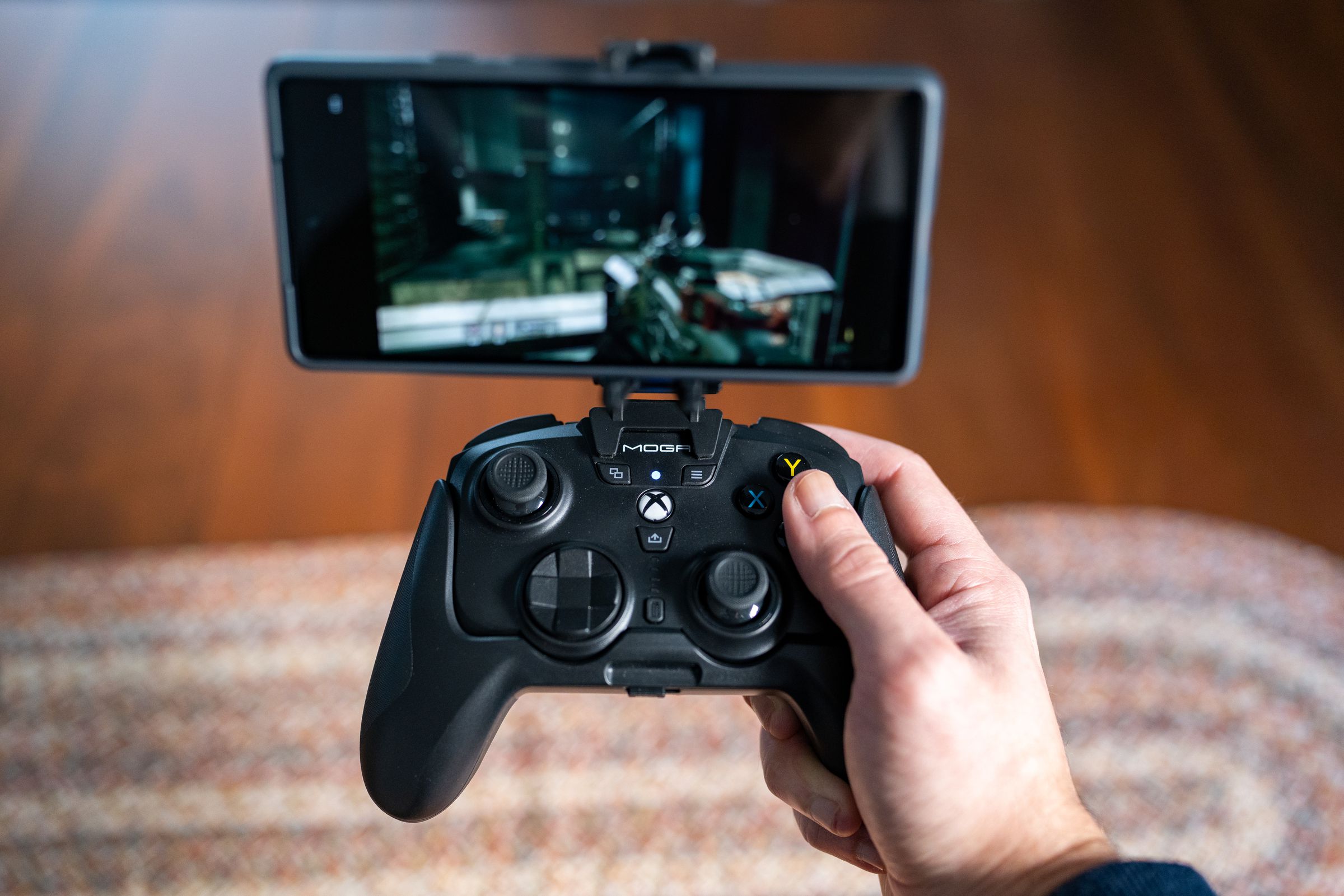 Due to the length of the attachable grip, when I move my thumb from stick to the buttons, it falls just short of my usual position — requiring a slight reach for the Y button.