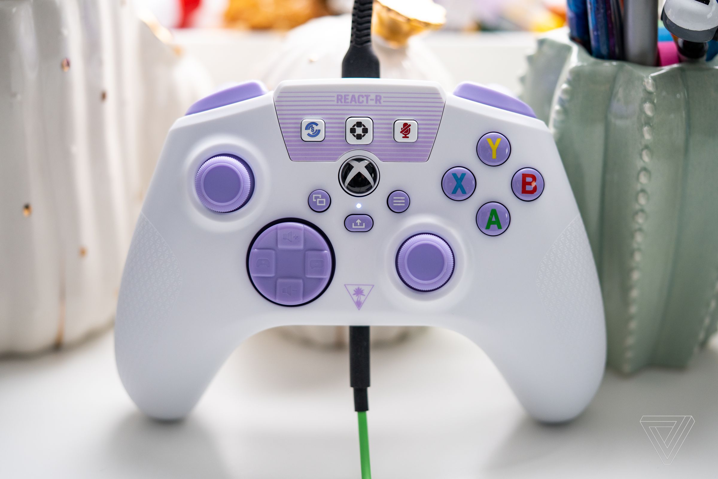 The Turtle Beach React-R Xbox controller in white / purple.