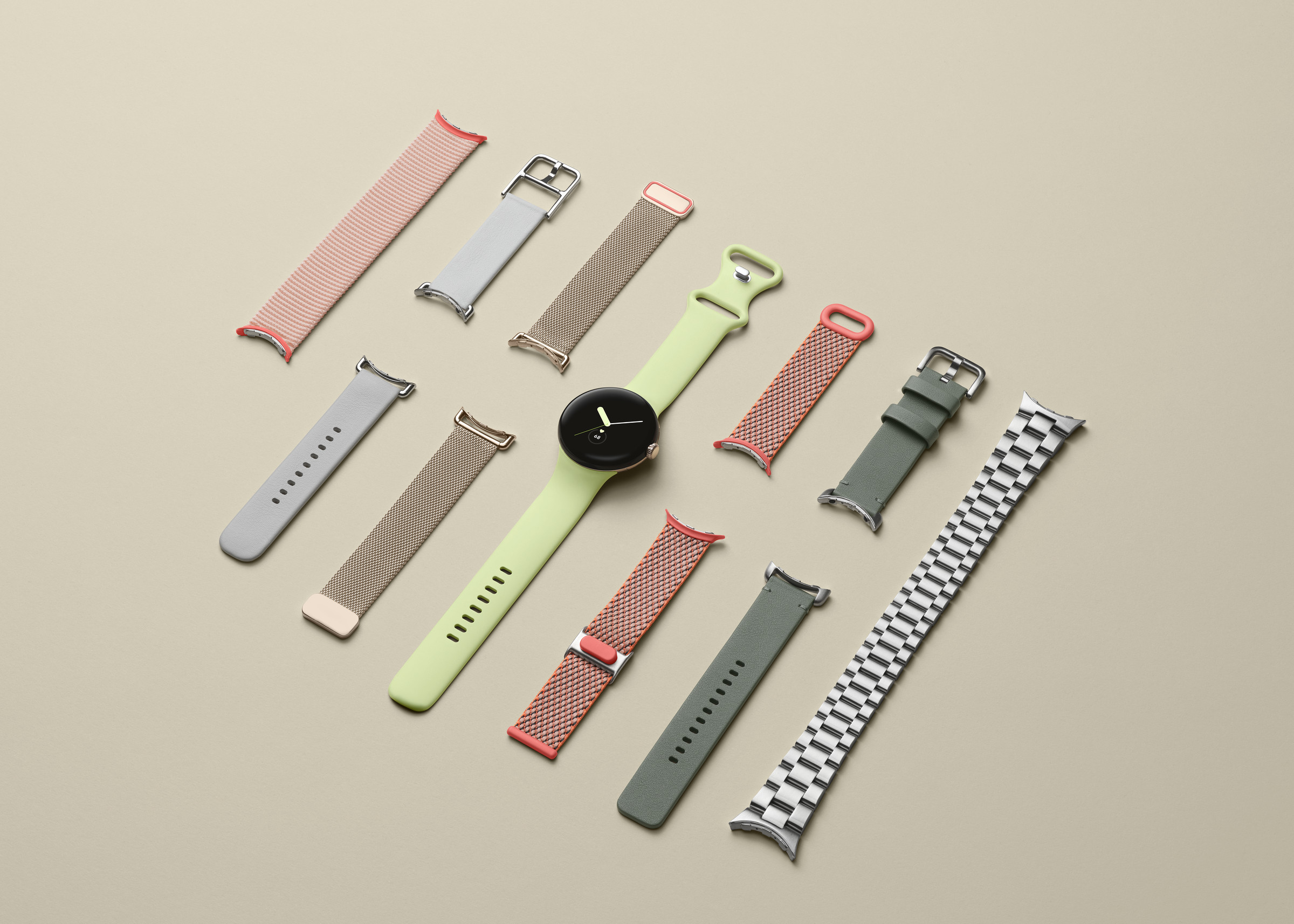 Pixel watch with all the band options laid out on the left and right sides.