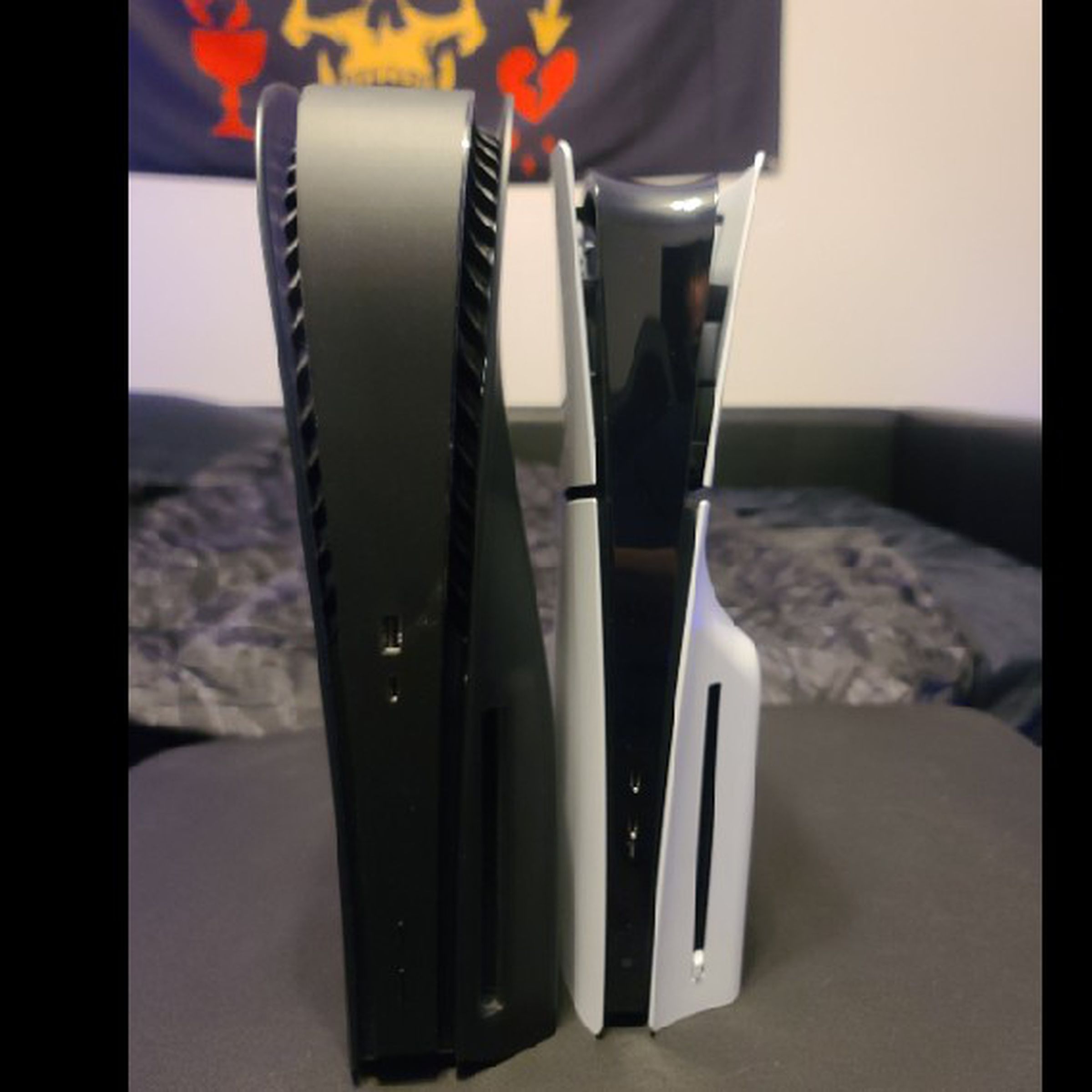 A photo showing the new PS5 next to the original