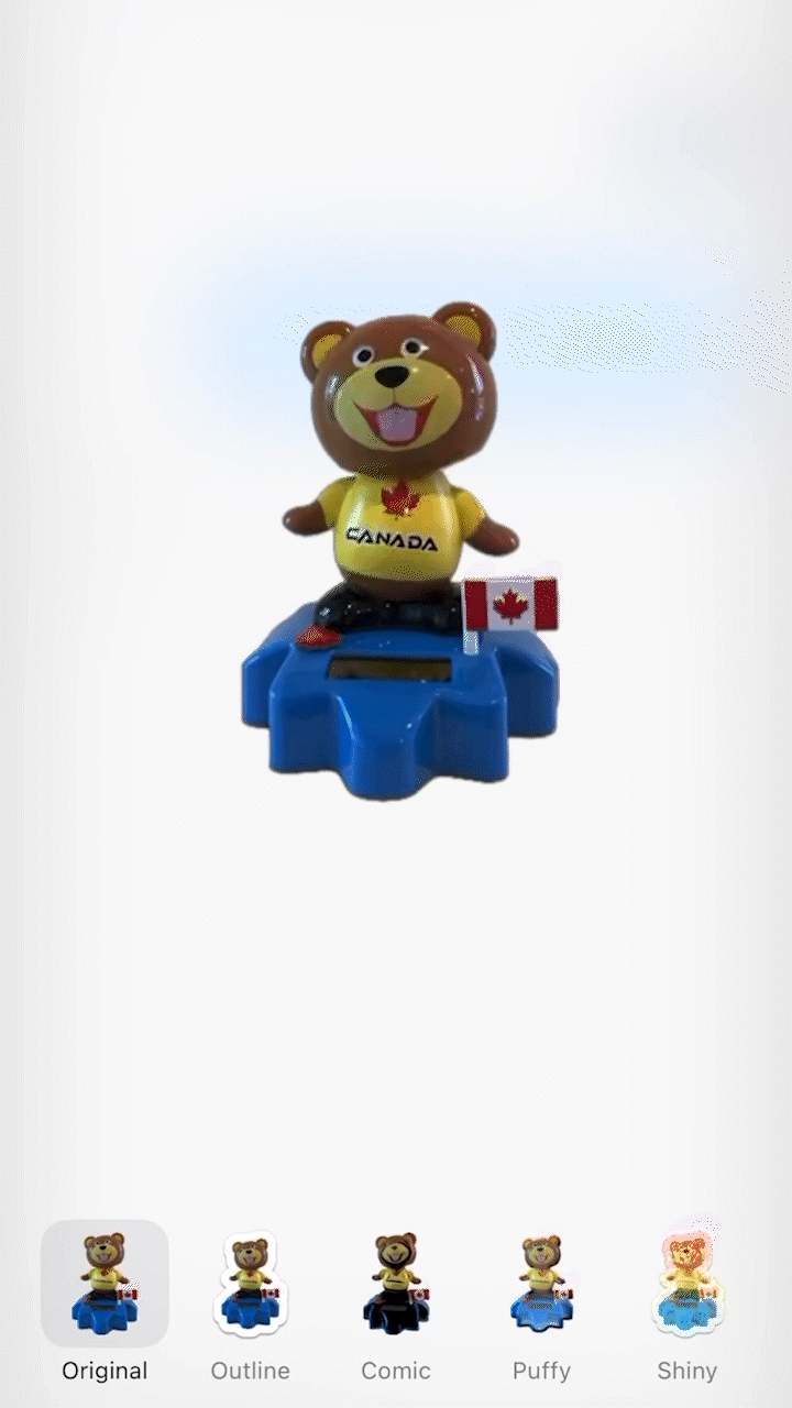 Animated GIF of a dancing toy beaver wearing a shirt that says Canada.