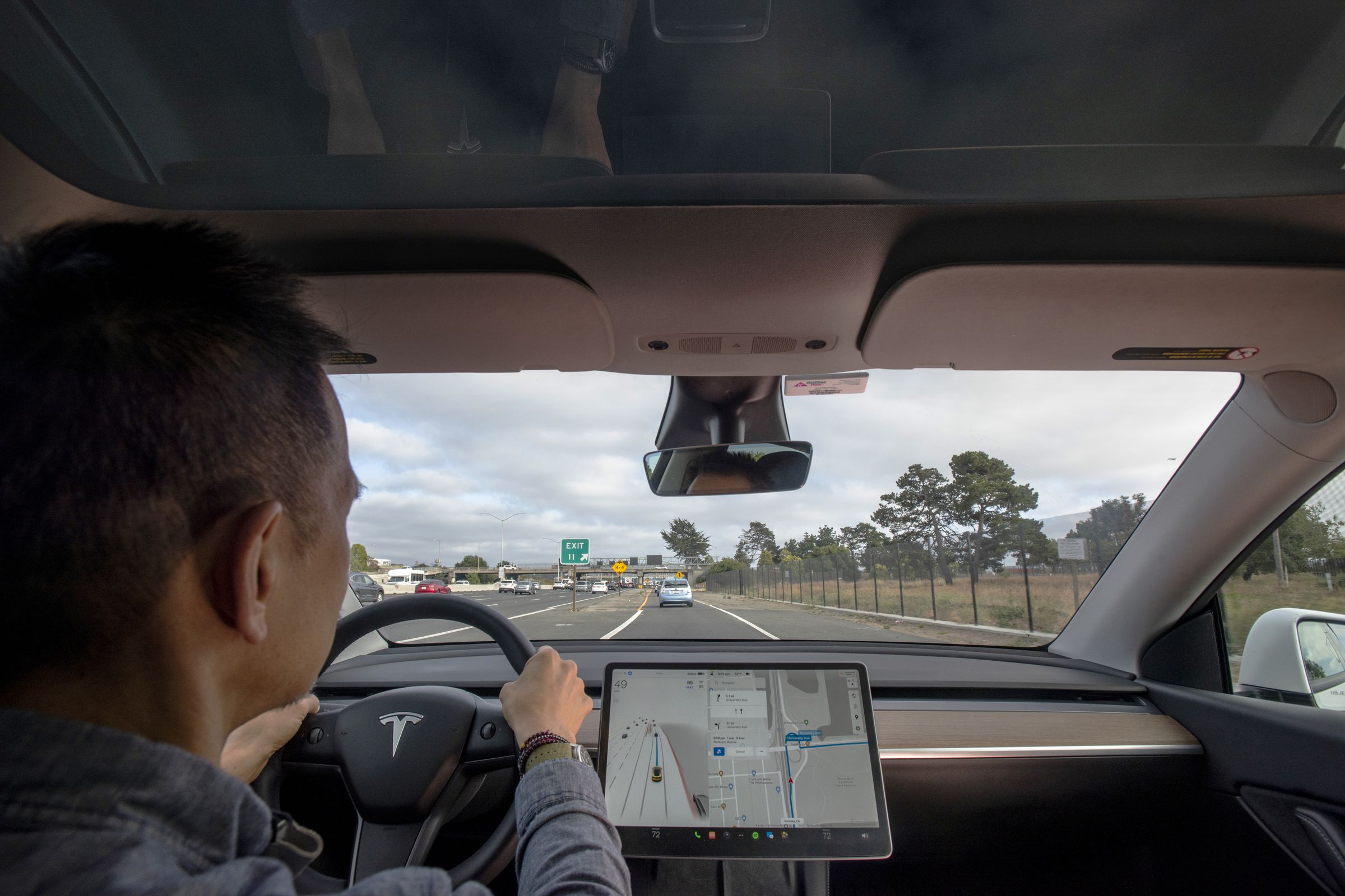 View of FSD system in action with Tesla dashboard display