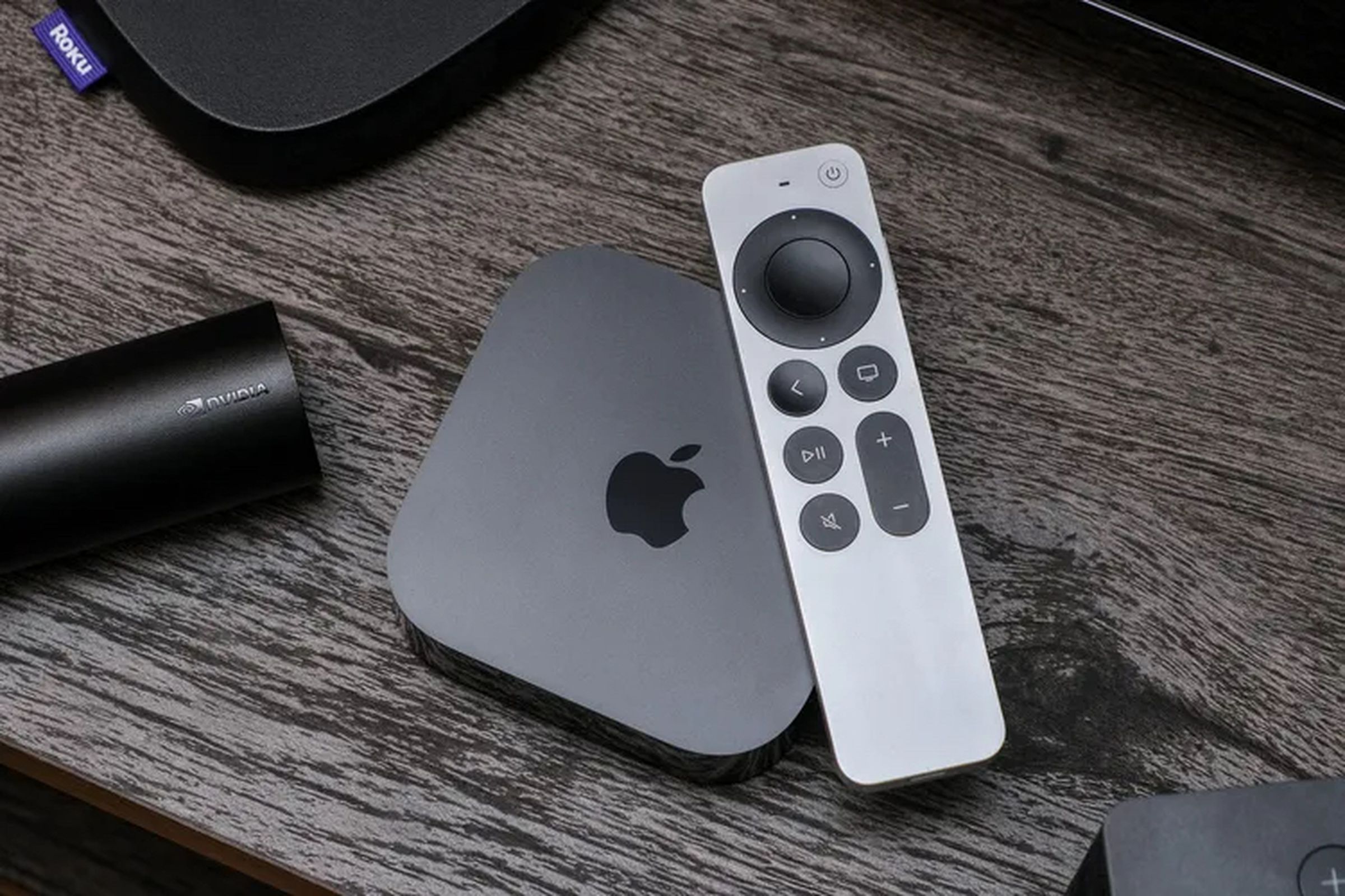 An image showing an Apple TV device and remote 