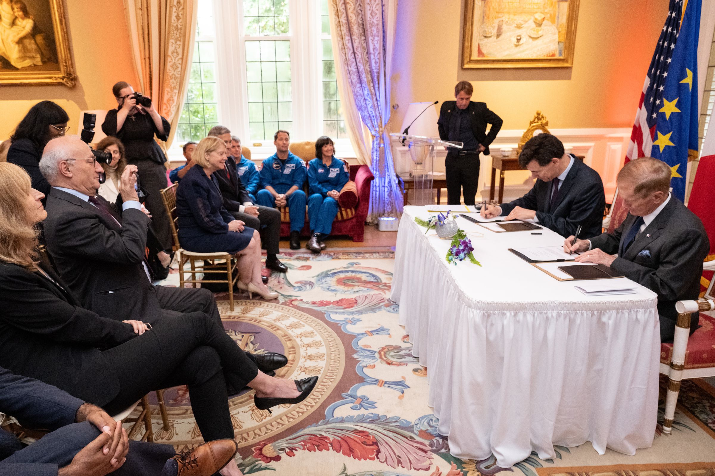 NASA Administrator Bill Nelson (far right) and Philippe Baptiste, president of CNES, signing the Artemis Accords at the French Ambassador’s Residence in Washington.