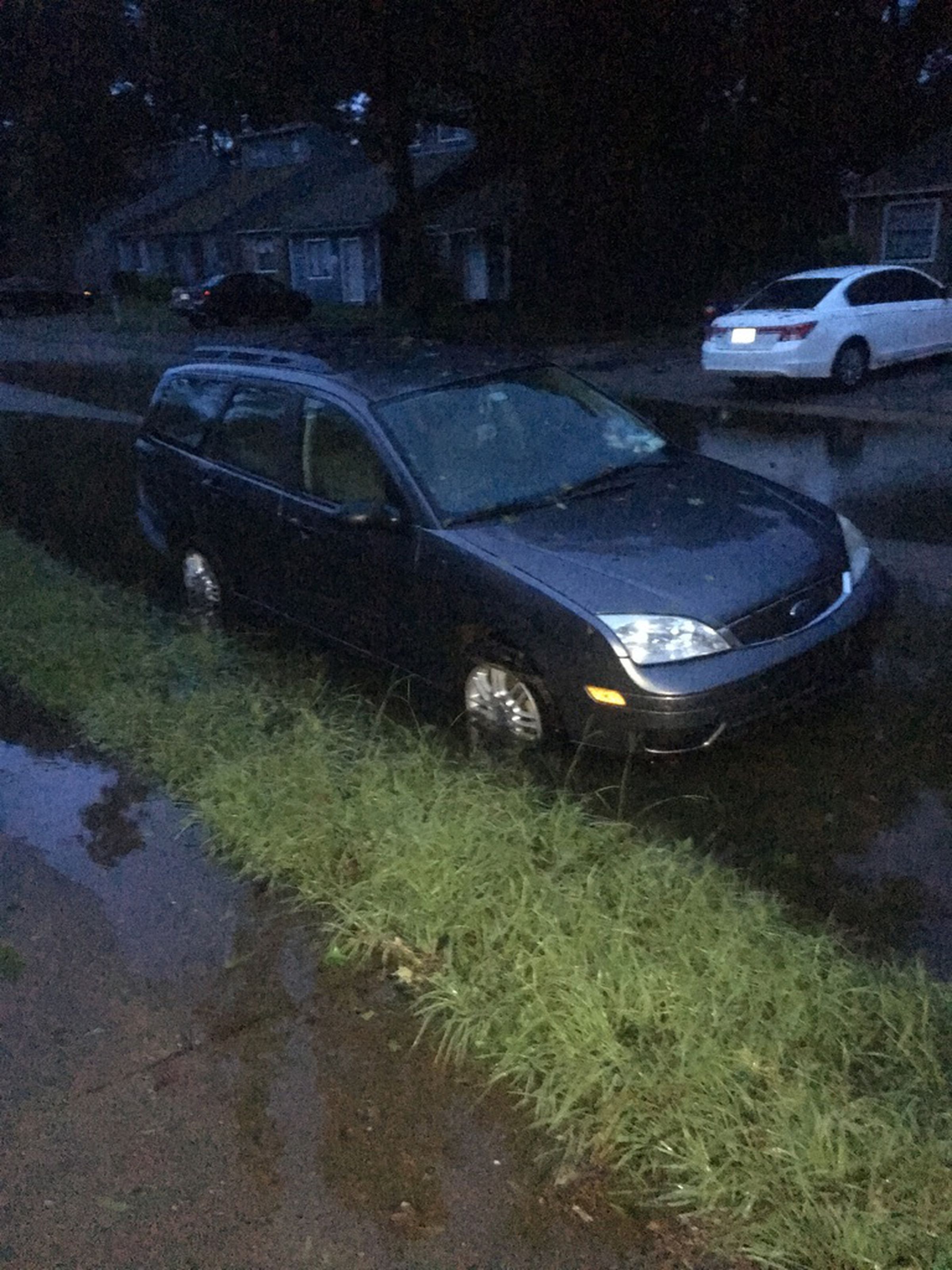 My car, full of water. Please excuse the iPhone 6S’s poor quality, my good camera was taking a swim inside the car.