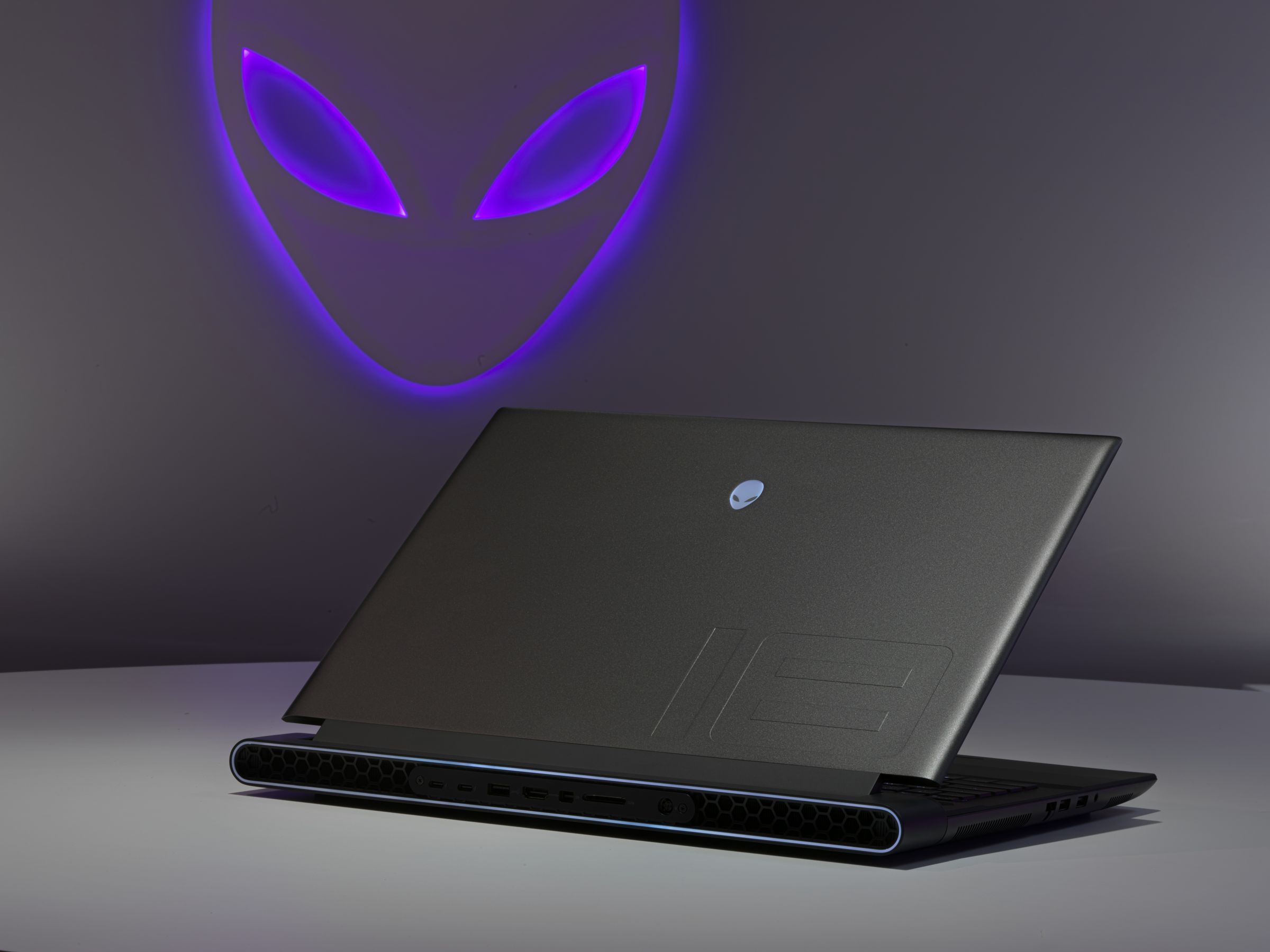 The Alienware m18 seen from behind half closed.