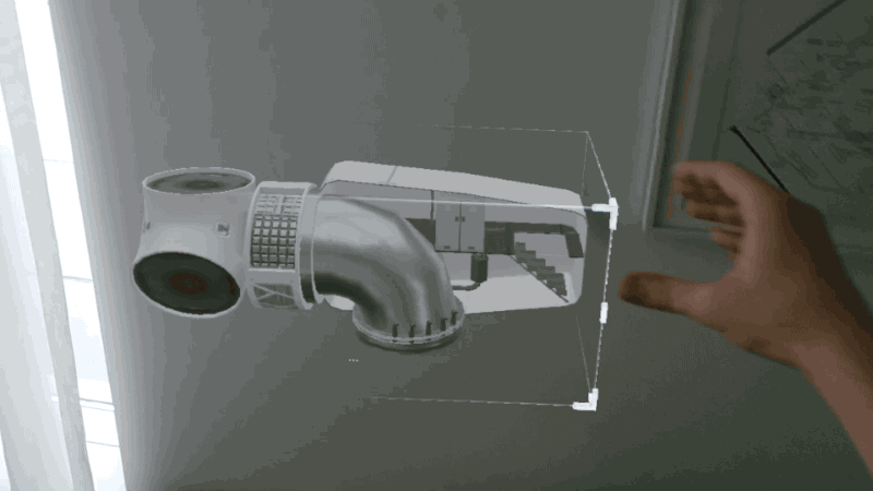 Resizing a hologram with a natural gesture. Footage does not show actual Field of View.