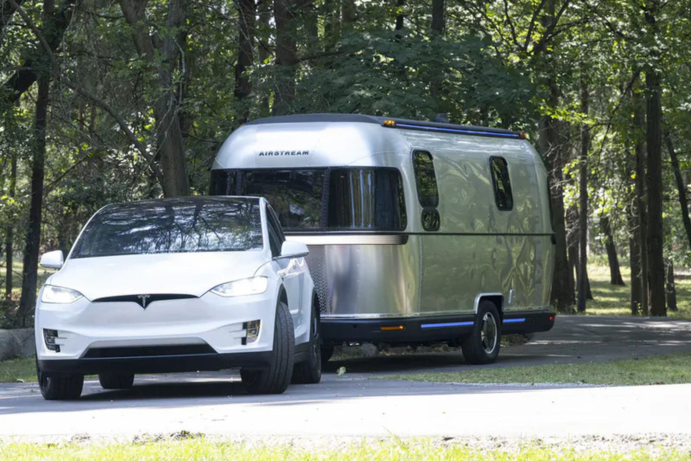 Airstream eStream concept by Thor Industries — being towed by a Tesla Model X