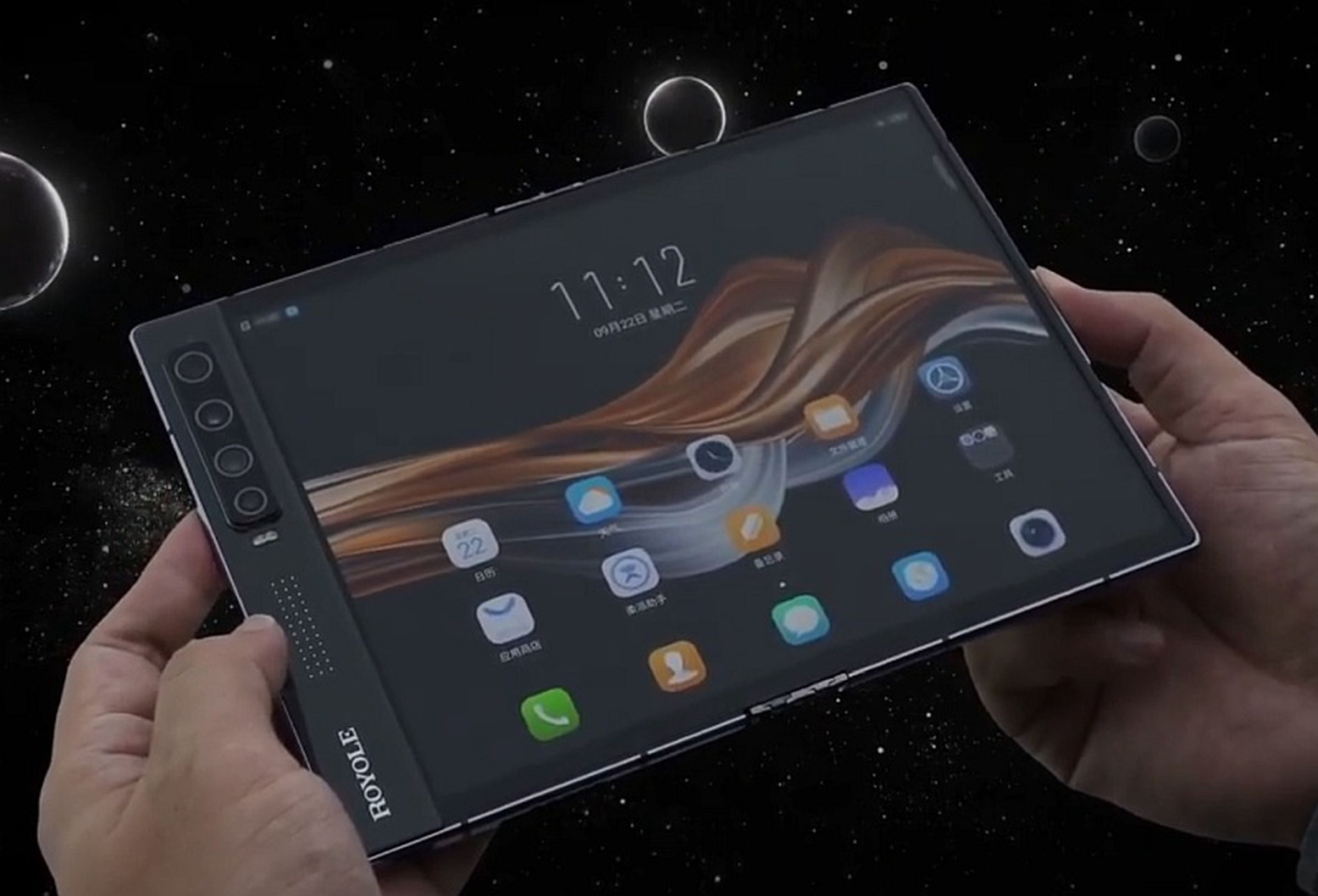 This might be a picture of the actual phone, from the demo. All other pictures appear to be renders.