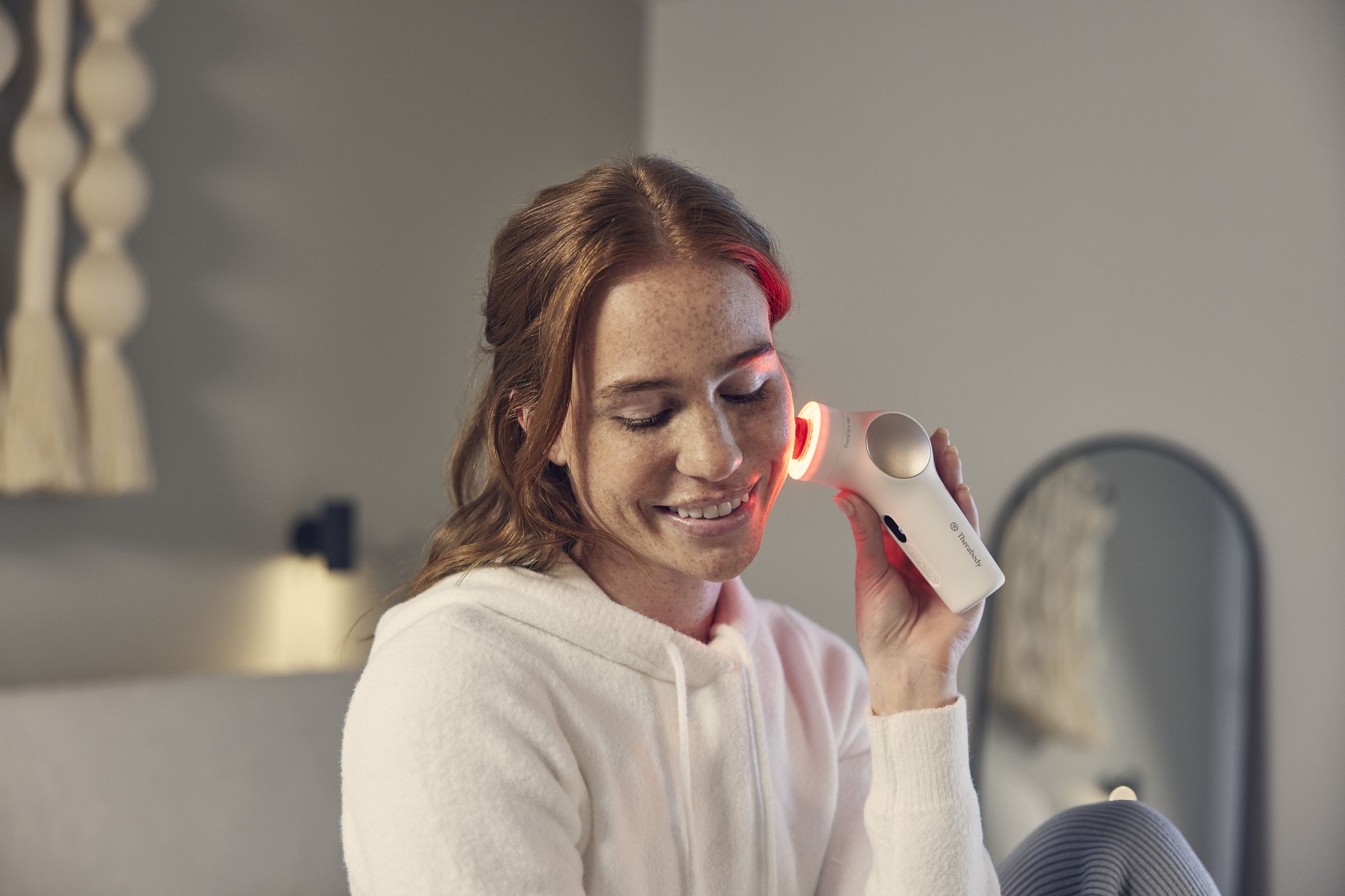 Therabody has a new massage gun for your face. It also does LED light therapy.