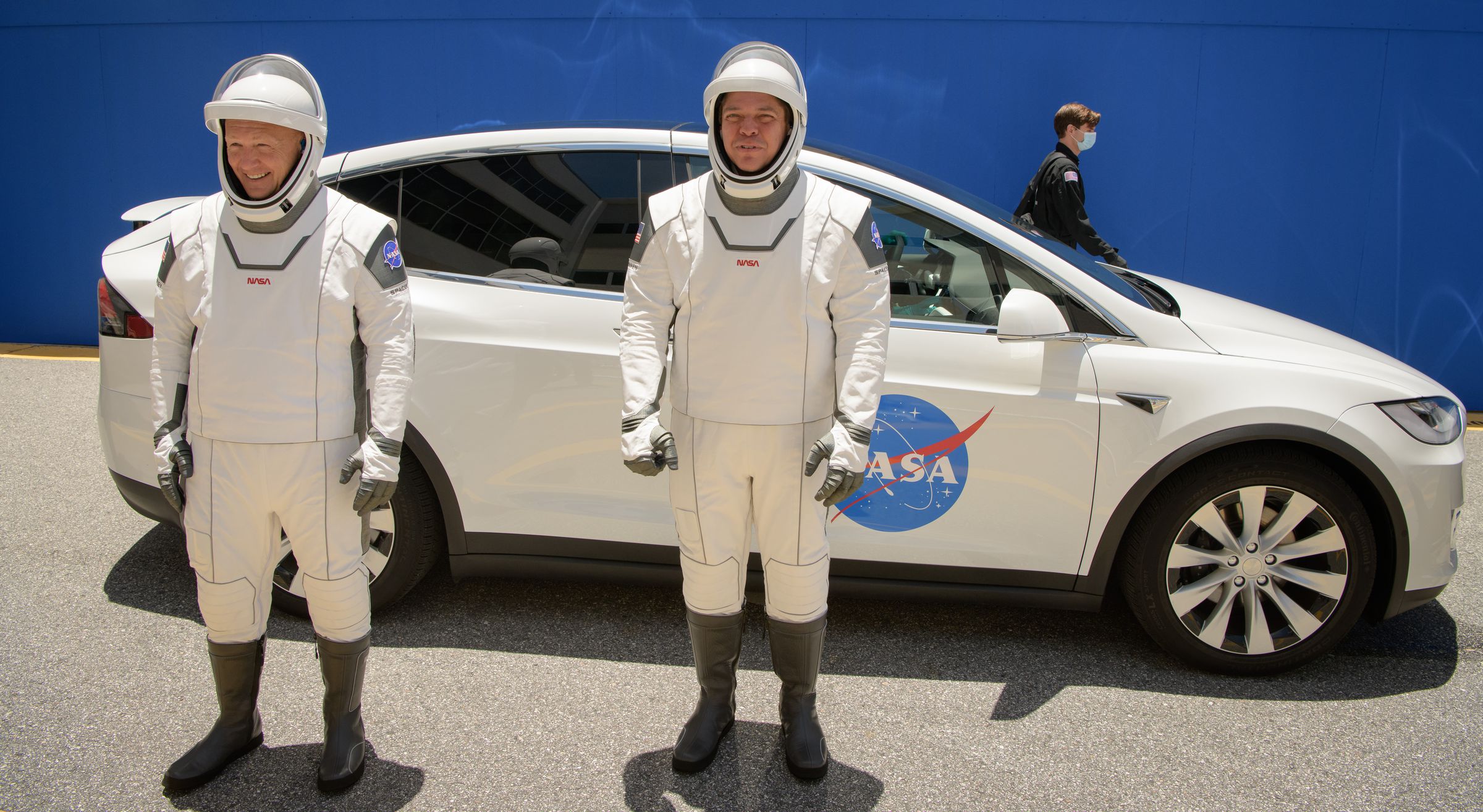 Hurley (R) and Behnken (L) outside of the Tesla that will take them to the launchpad.
