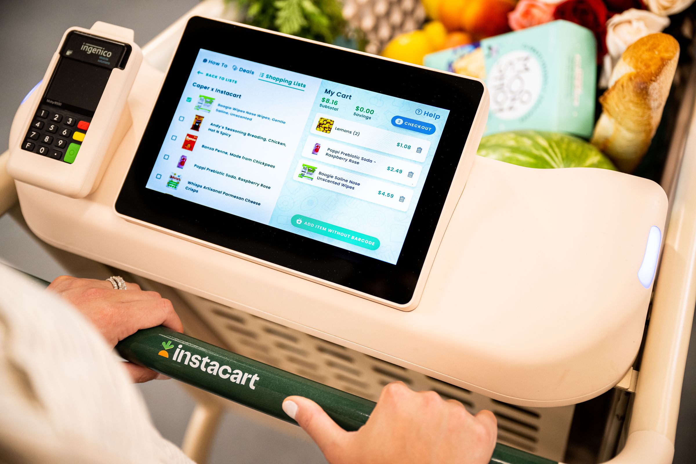 You scan the Caper Cart’s QR code in the Instacart app and it syncs your shopping lists. You can then pay right on the cart.