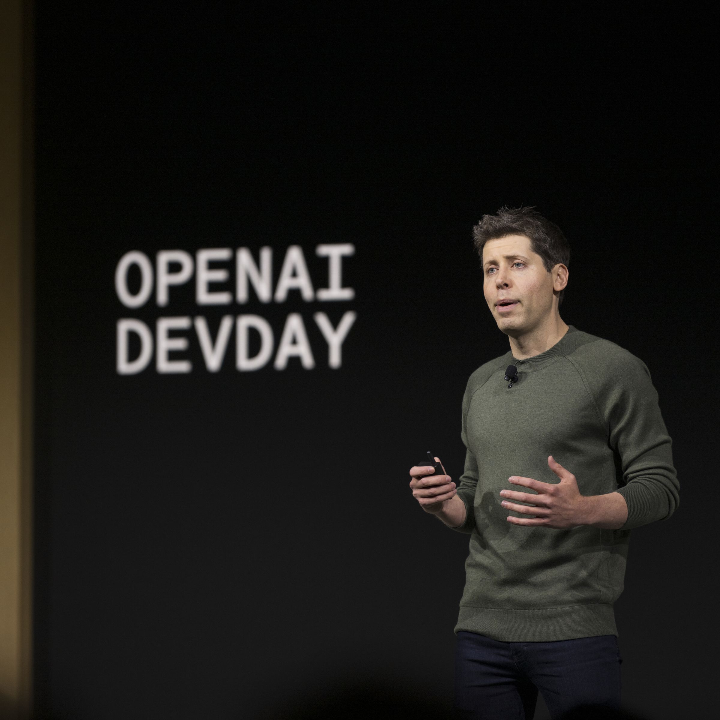 Sam Altman onstage at OpenAI DevDay.