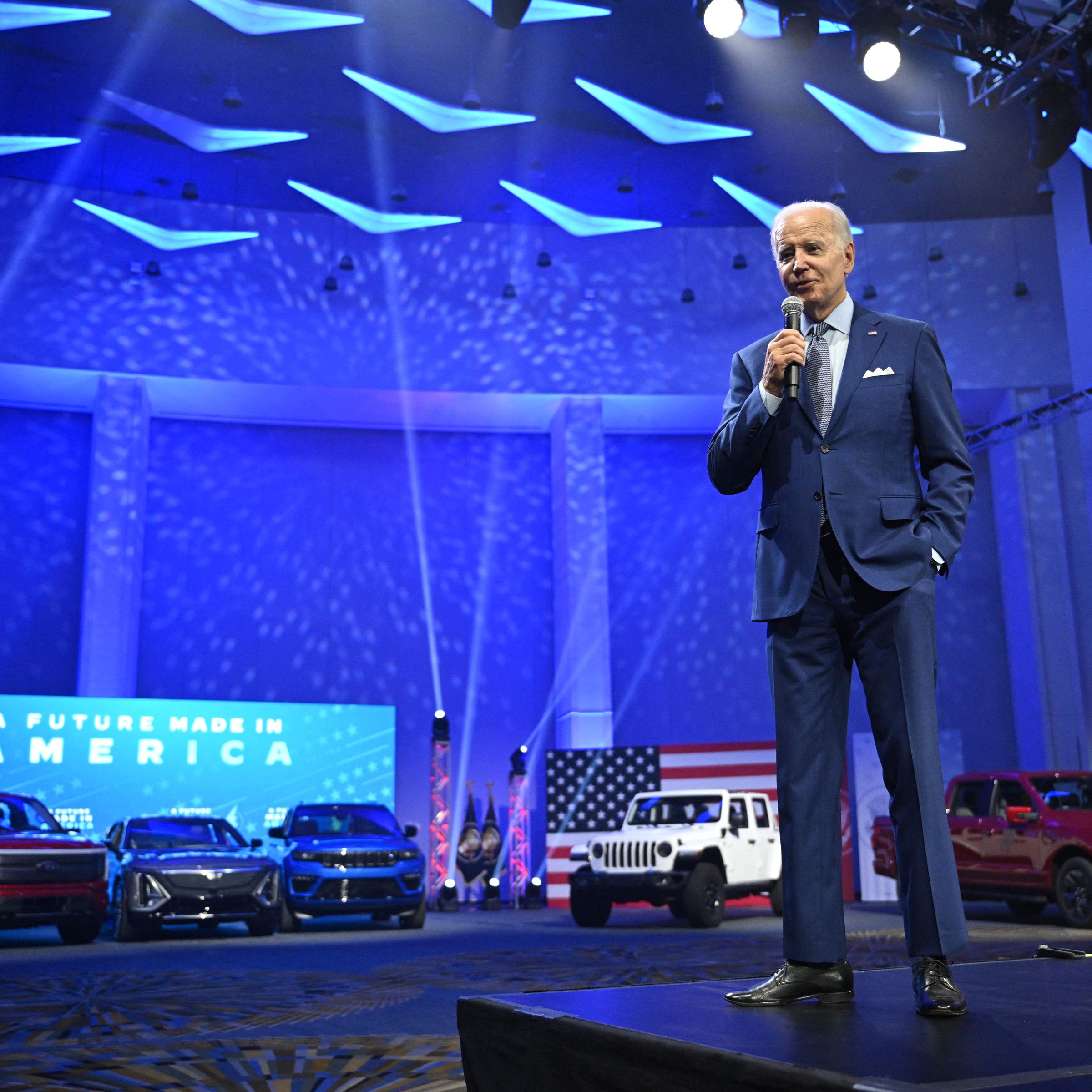 President Biden on stage with EVs