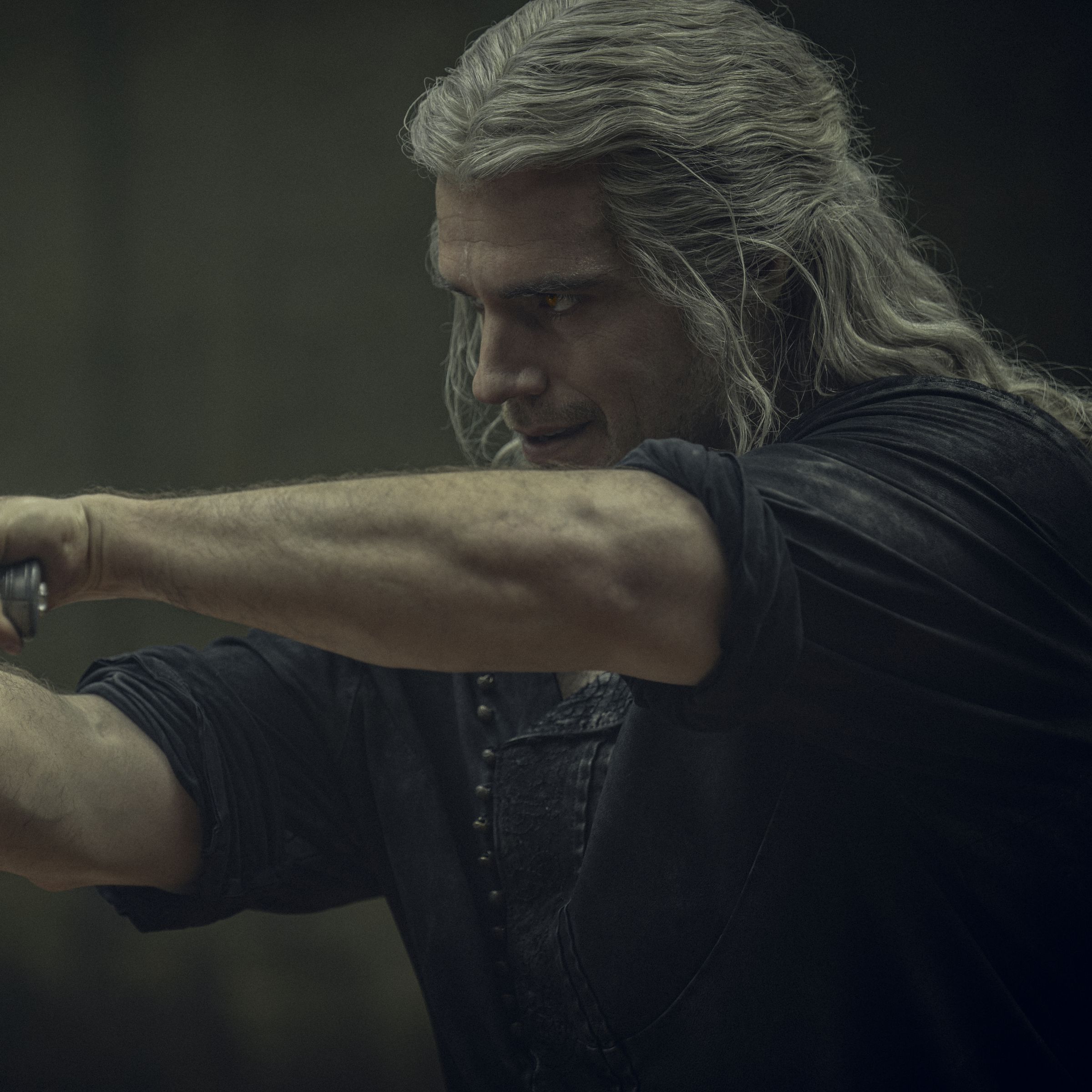 A still photo of Henry Cavill in The Witcher.