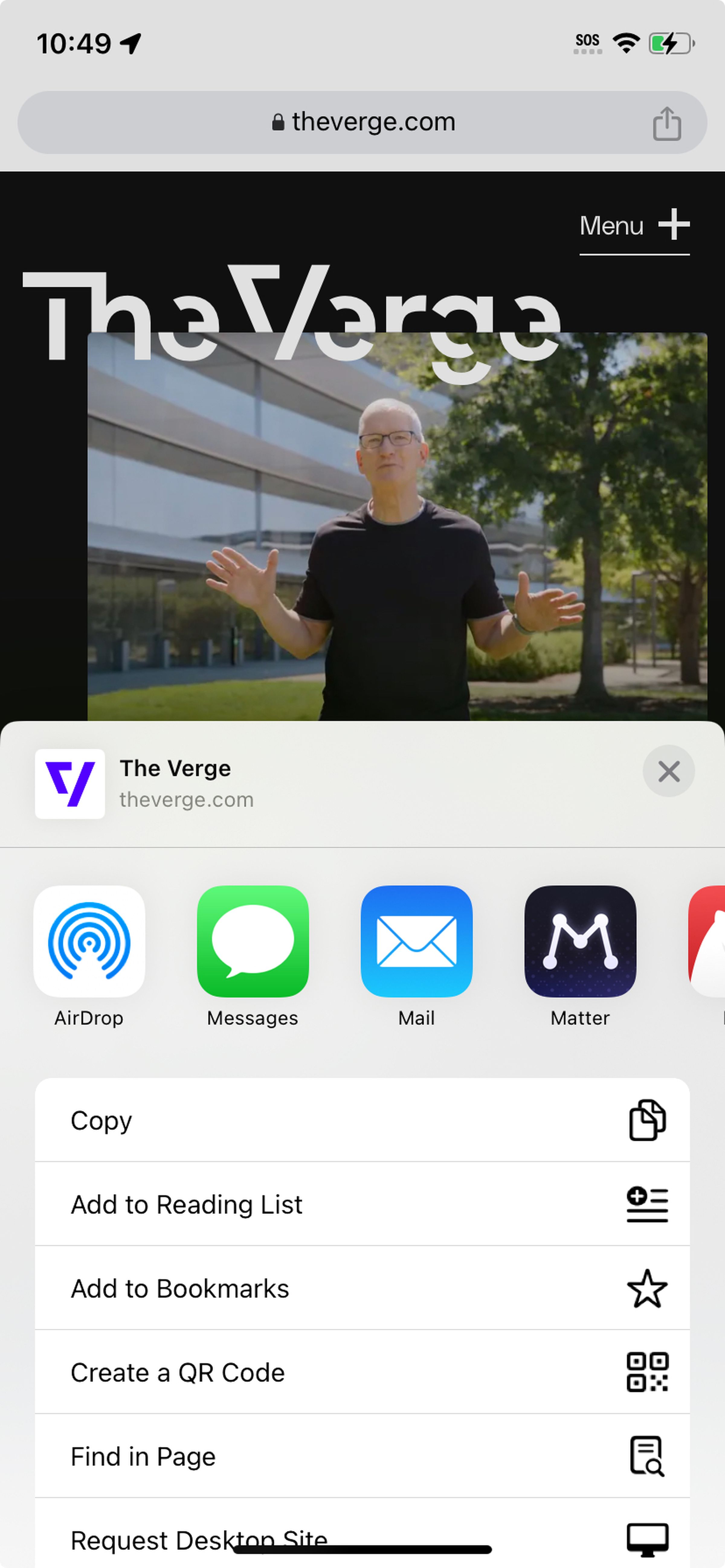 Mobile screen with a screenshot from The Verge on top, and a pop-up menu with several app icons across the top and a menu including Create a QR Code below that.