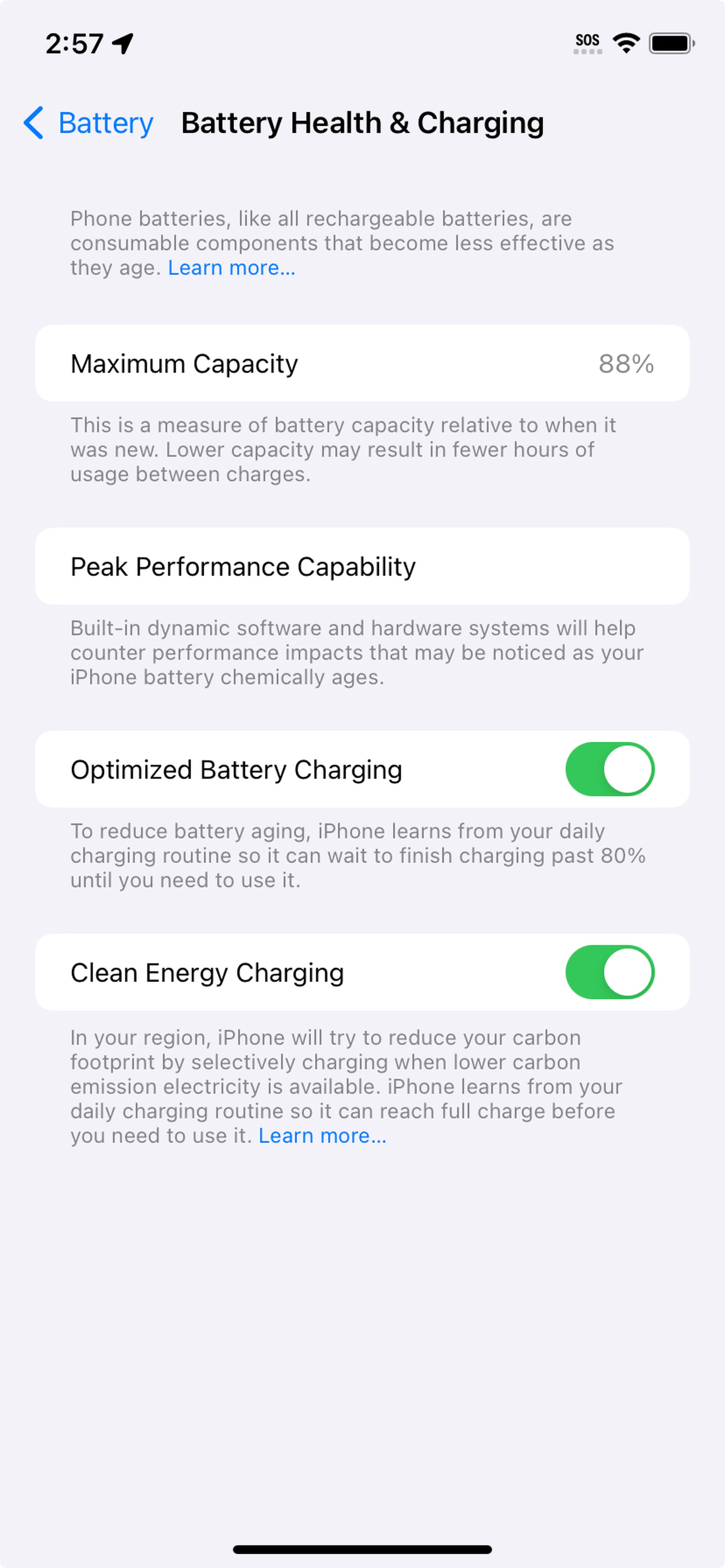 iPhone screen headed Battery Health &amp; Charging, below is Maximum Capacity 88%, Peak Performance Capability, Optimized Battery Charging toggled on, and Clean Energy Charging toggled on.
