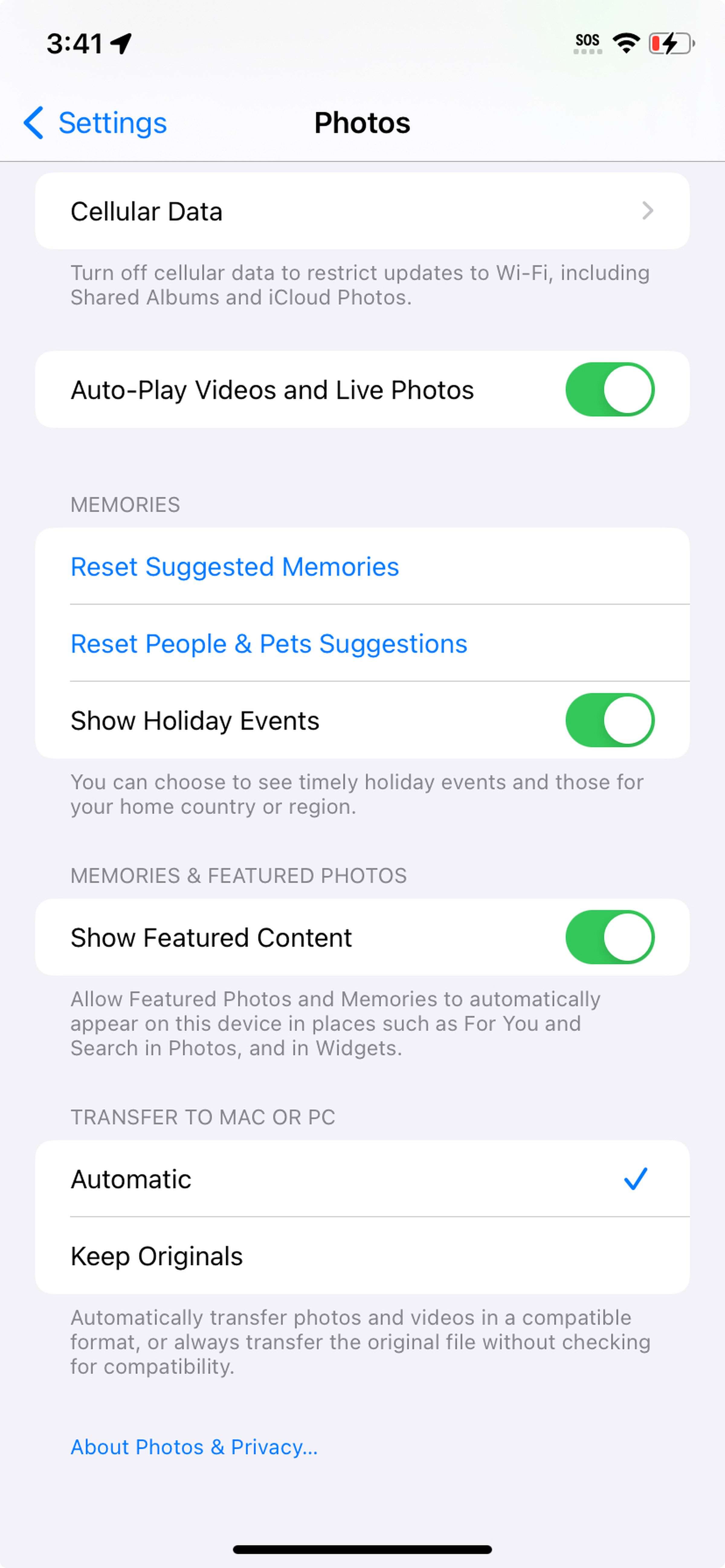 Photos settings page with a list of options, including Show Holiday Events.