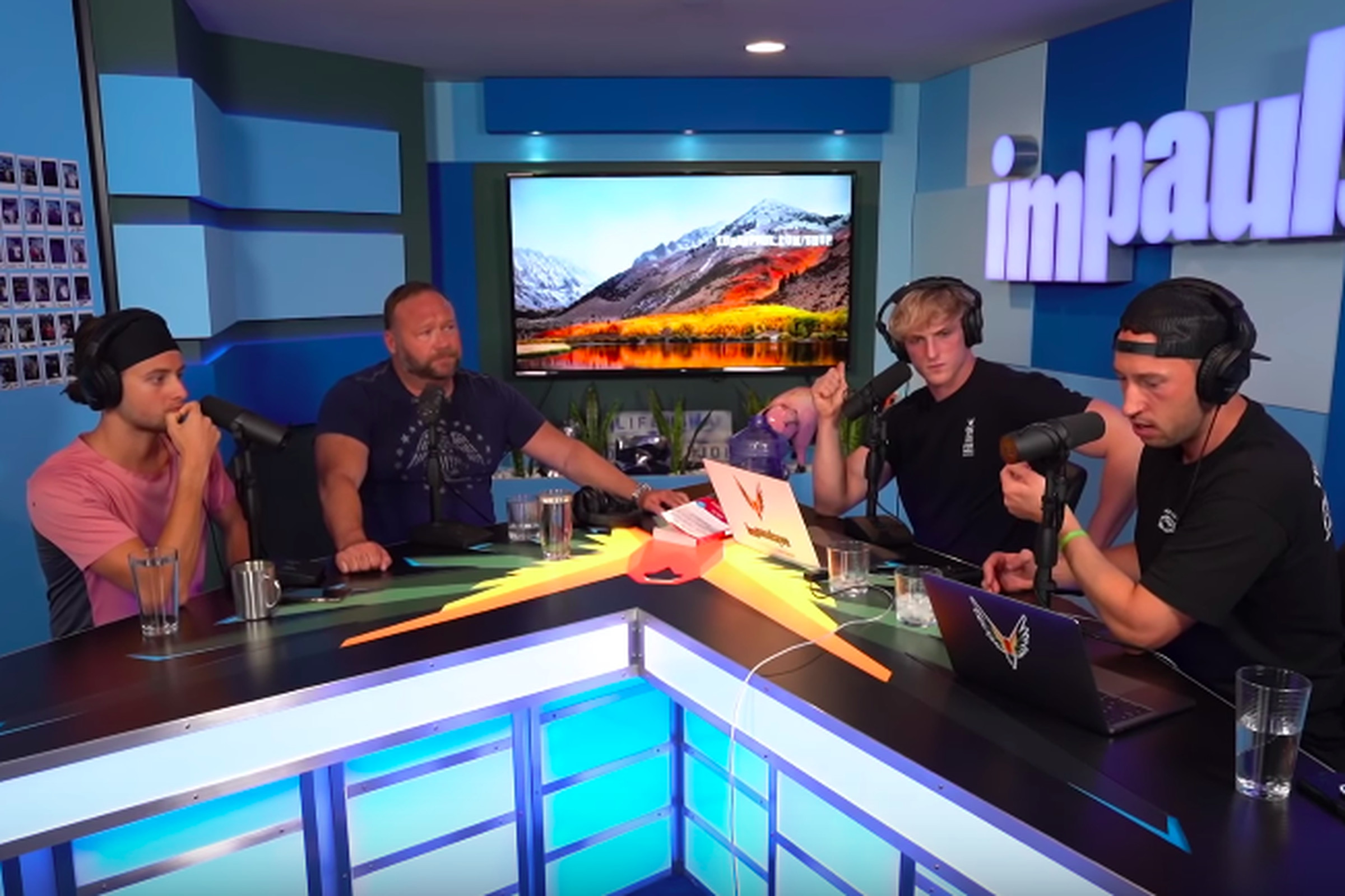Alex Jones (left) with Logan Paul and co-host Mike Majlak on an episode of Impaulsive.  