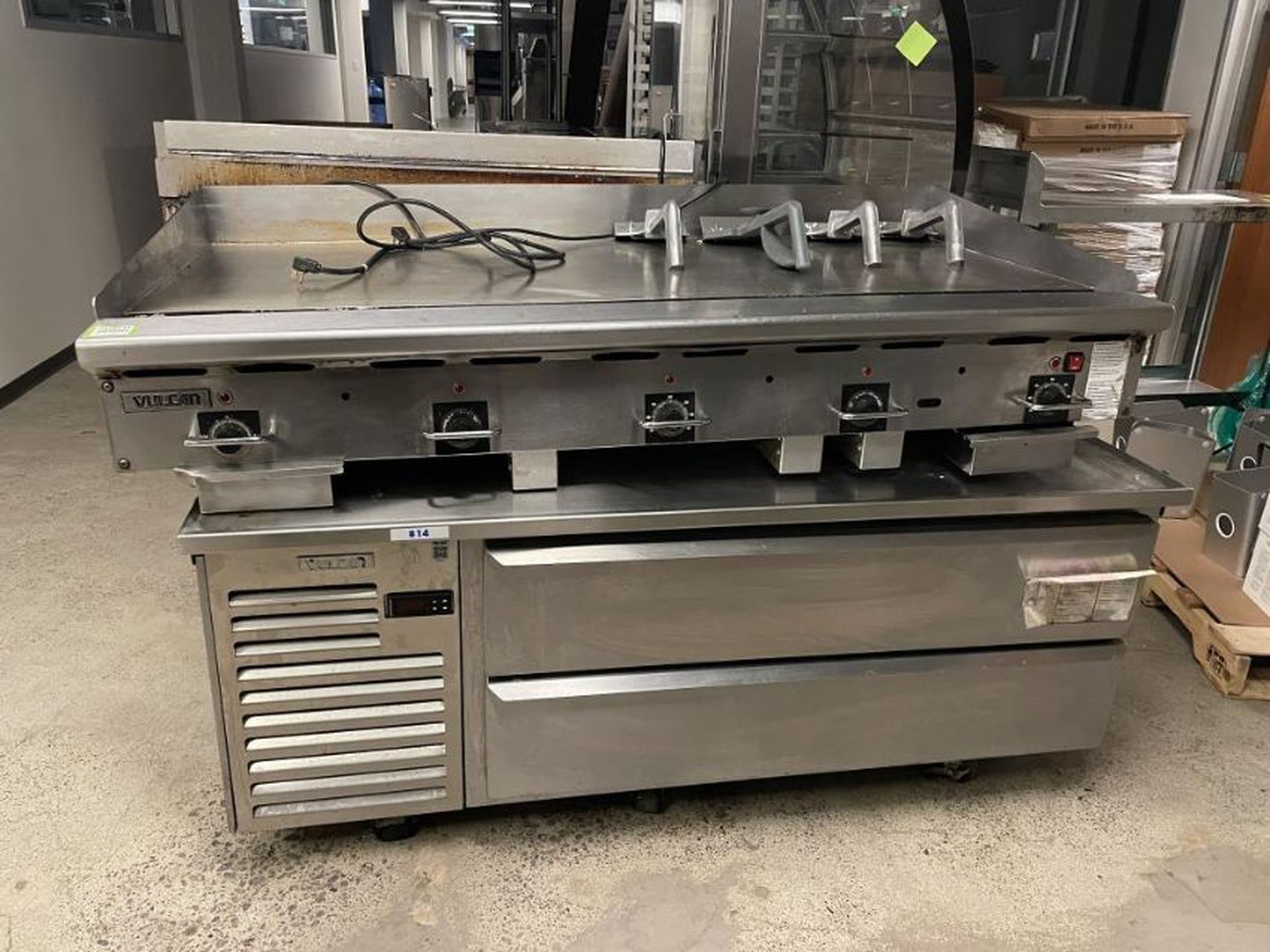 <em>Coffee machines, rotisserie ovens, and industrial griddles are also listed on the online auction.</em>
