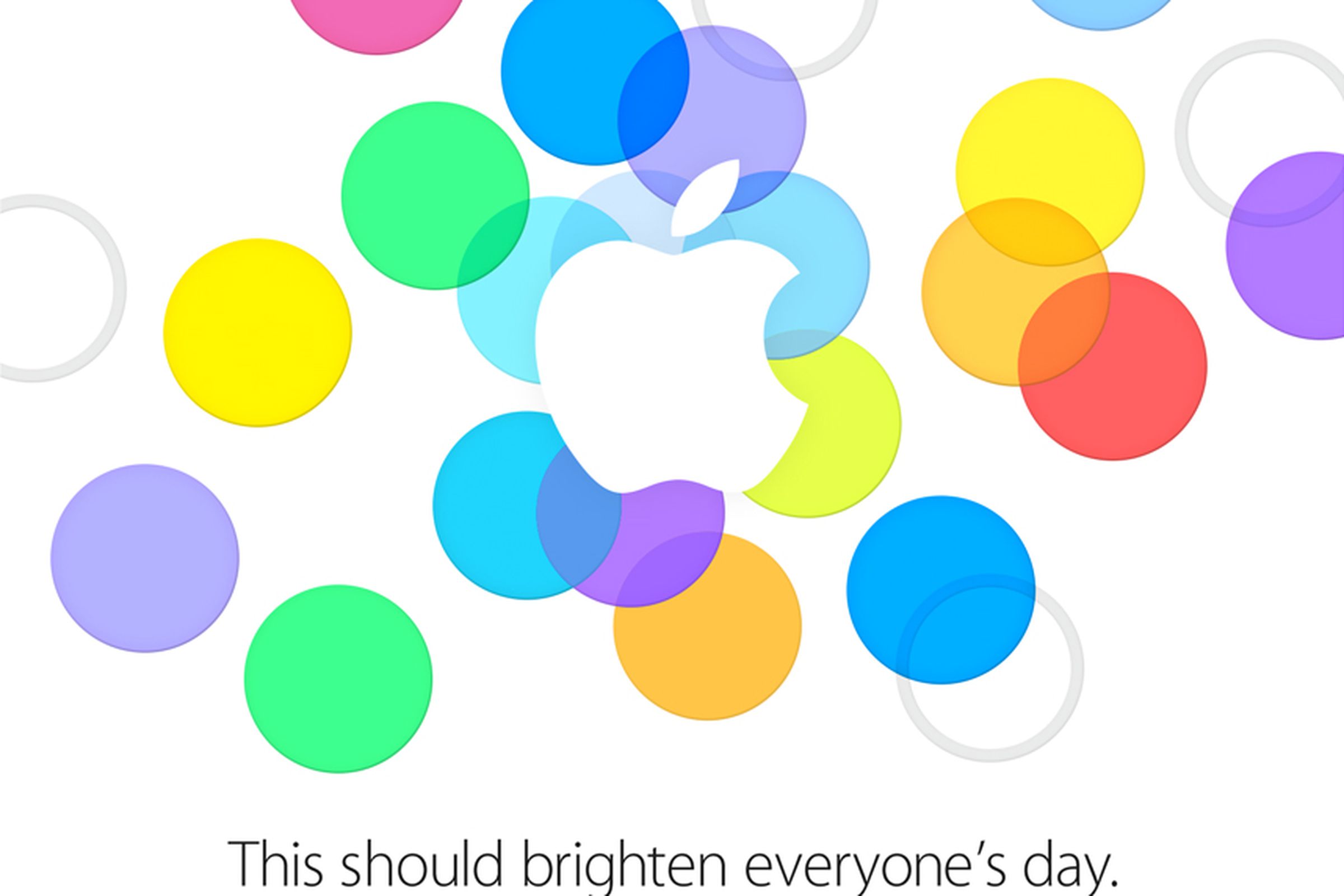 Colorful dots scattered behind the Apple logo.