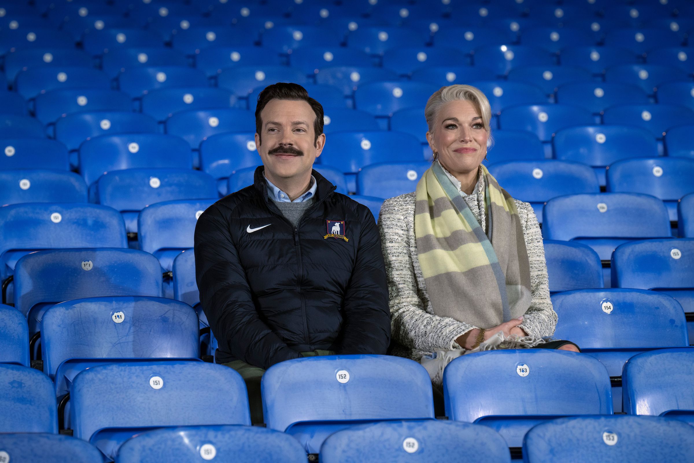 A still photo of Jason Sudeikis and Hannah Waddingham in Ted Lasso.