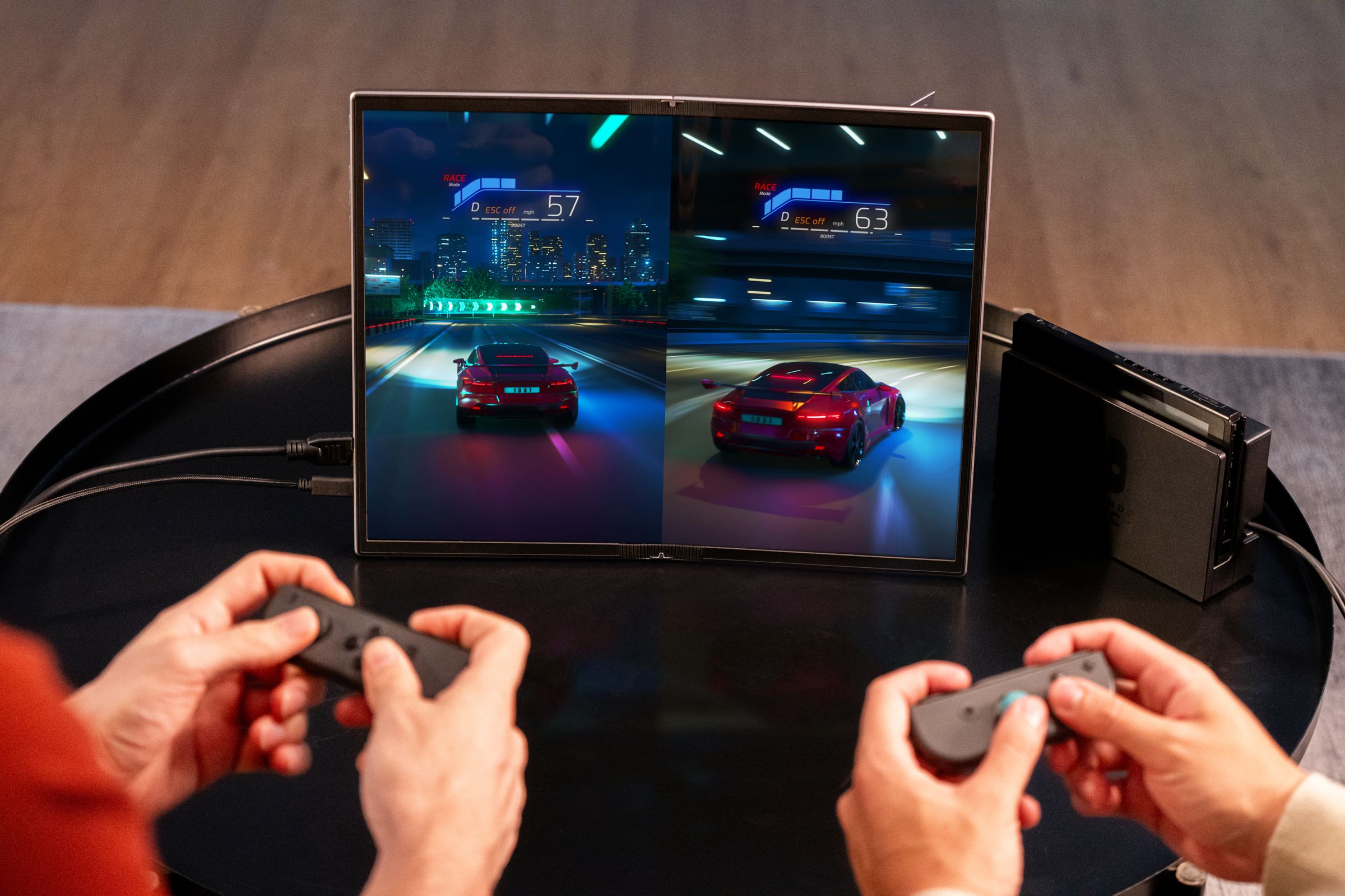 A game being played on two sides of the Asus ZenScreen Fold OLED (MQ17QH) screen.