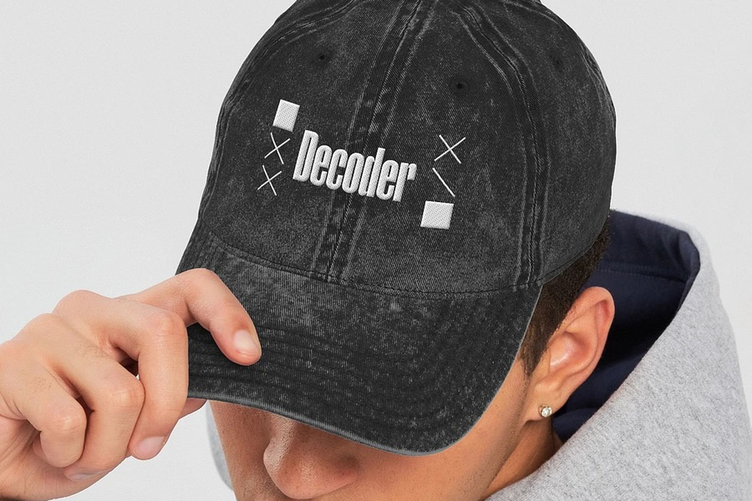 Model wearing a black Decoder hat
