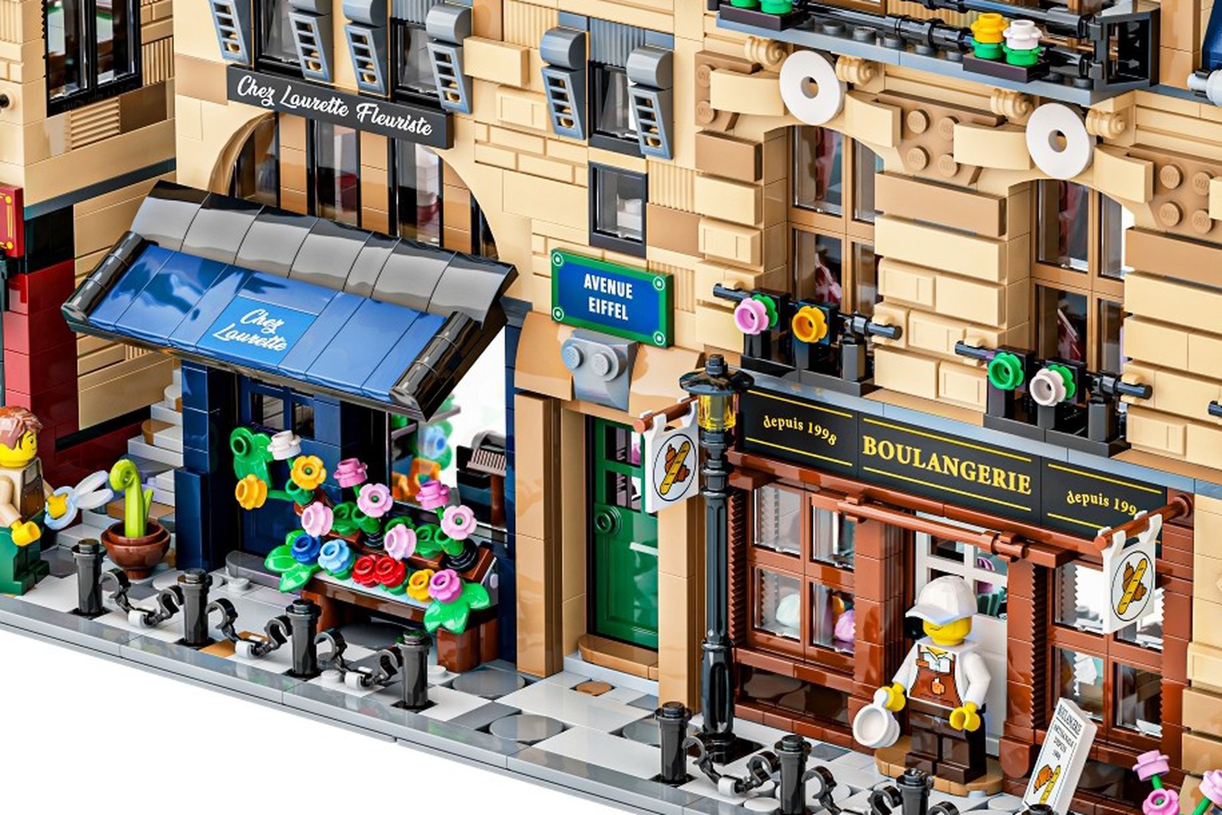 A Lego Parisian street with bakery and cafe done up with incredible detail