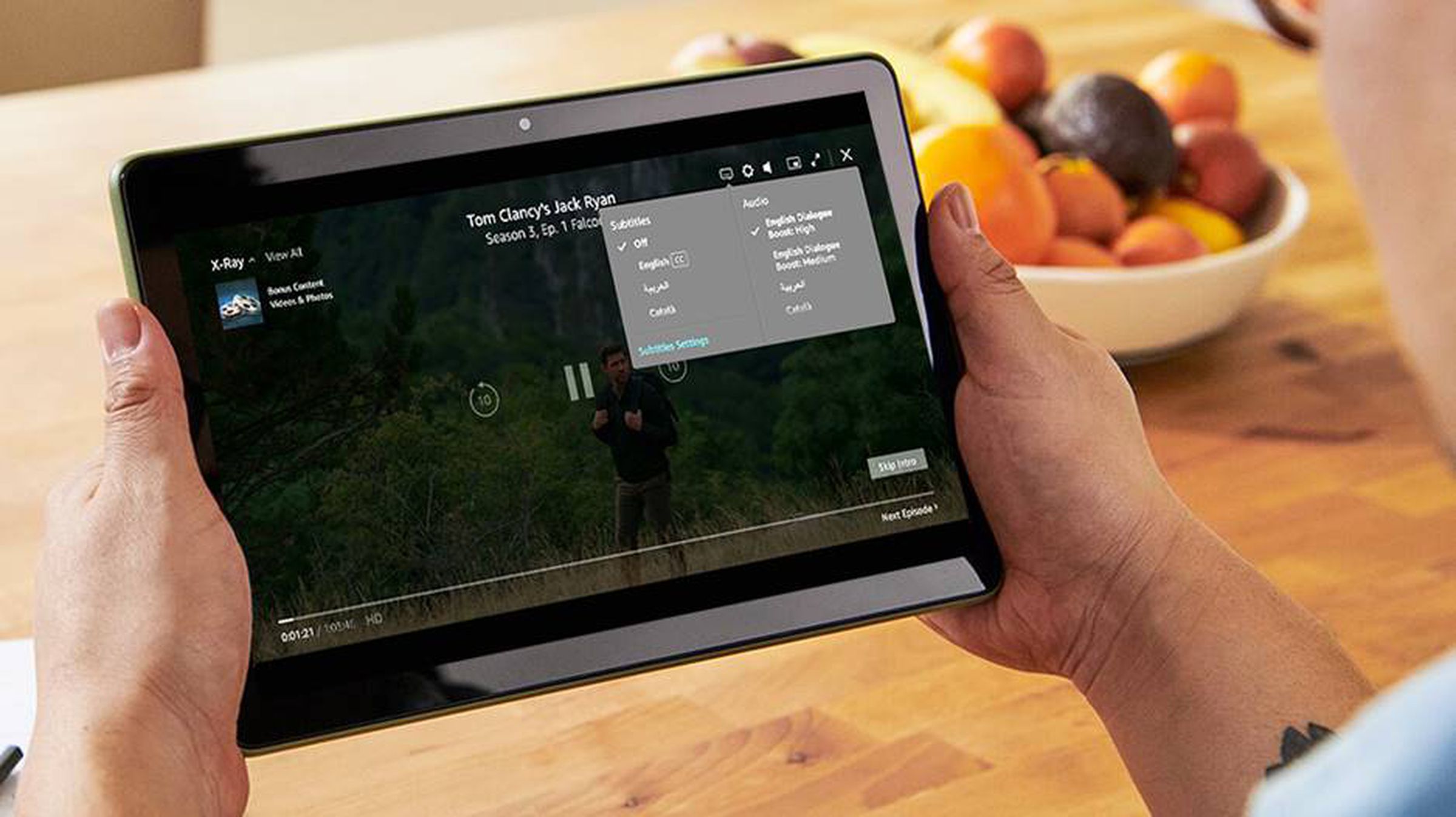 A marketing image of a tablet running Prime Video with the new Dialogue Boost feature.