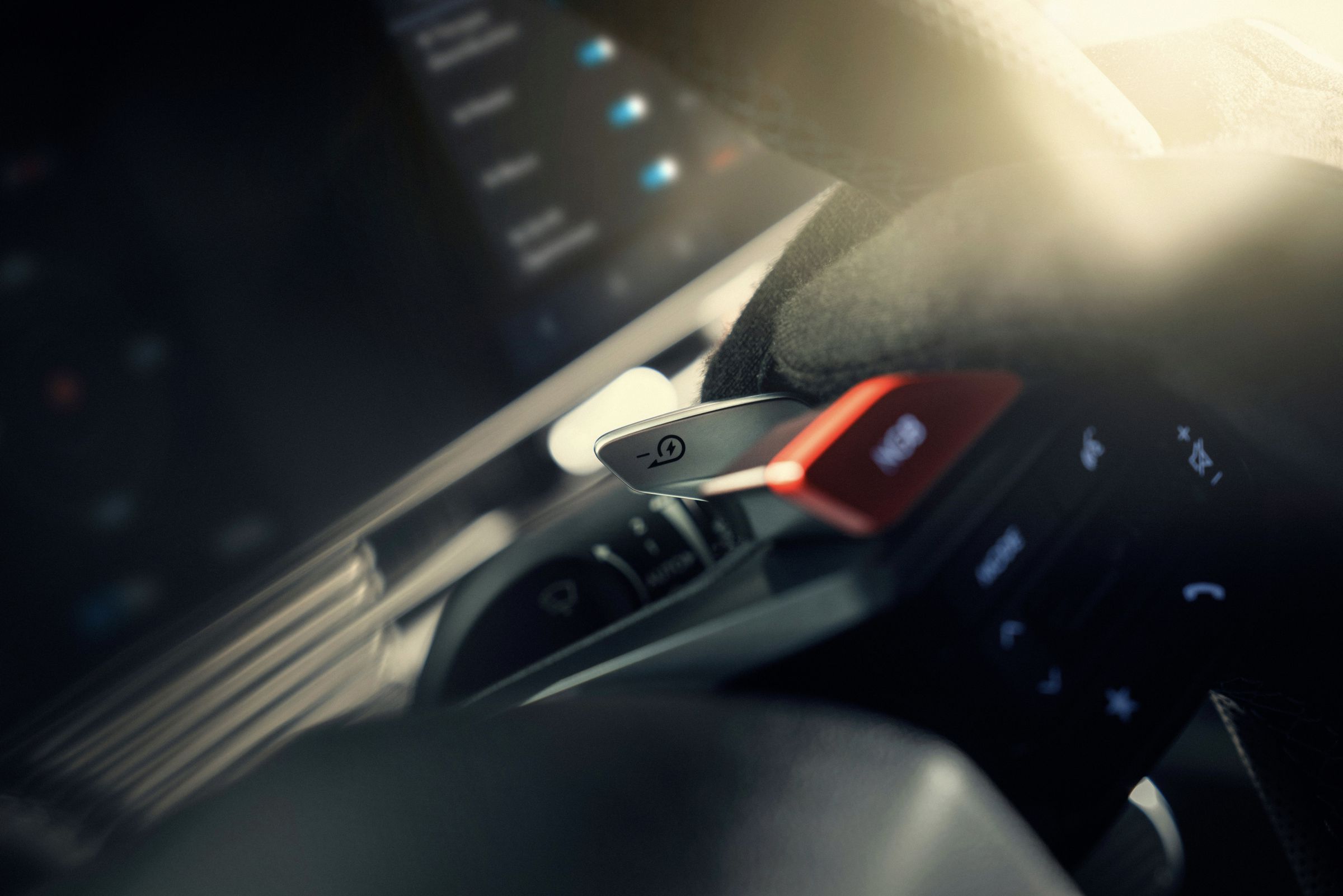 Closeup of Ioniq 5 N’s steering wheel right side with a shift paddle.