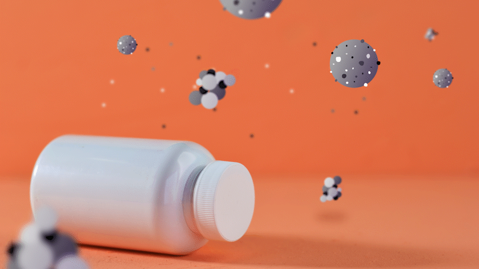 animated viruses float above a pill bottle. They fade in and out of view.