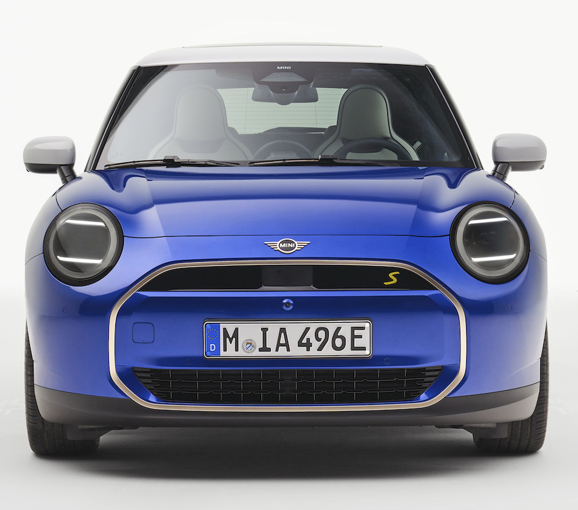 A front view of a blue 2025 Mini Cooper EV