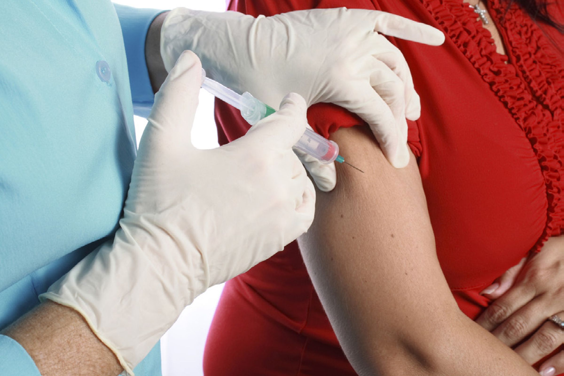 Woman getting flu shot (Credit: NIH Record)