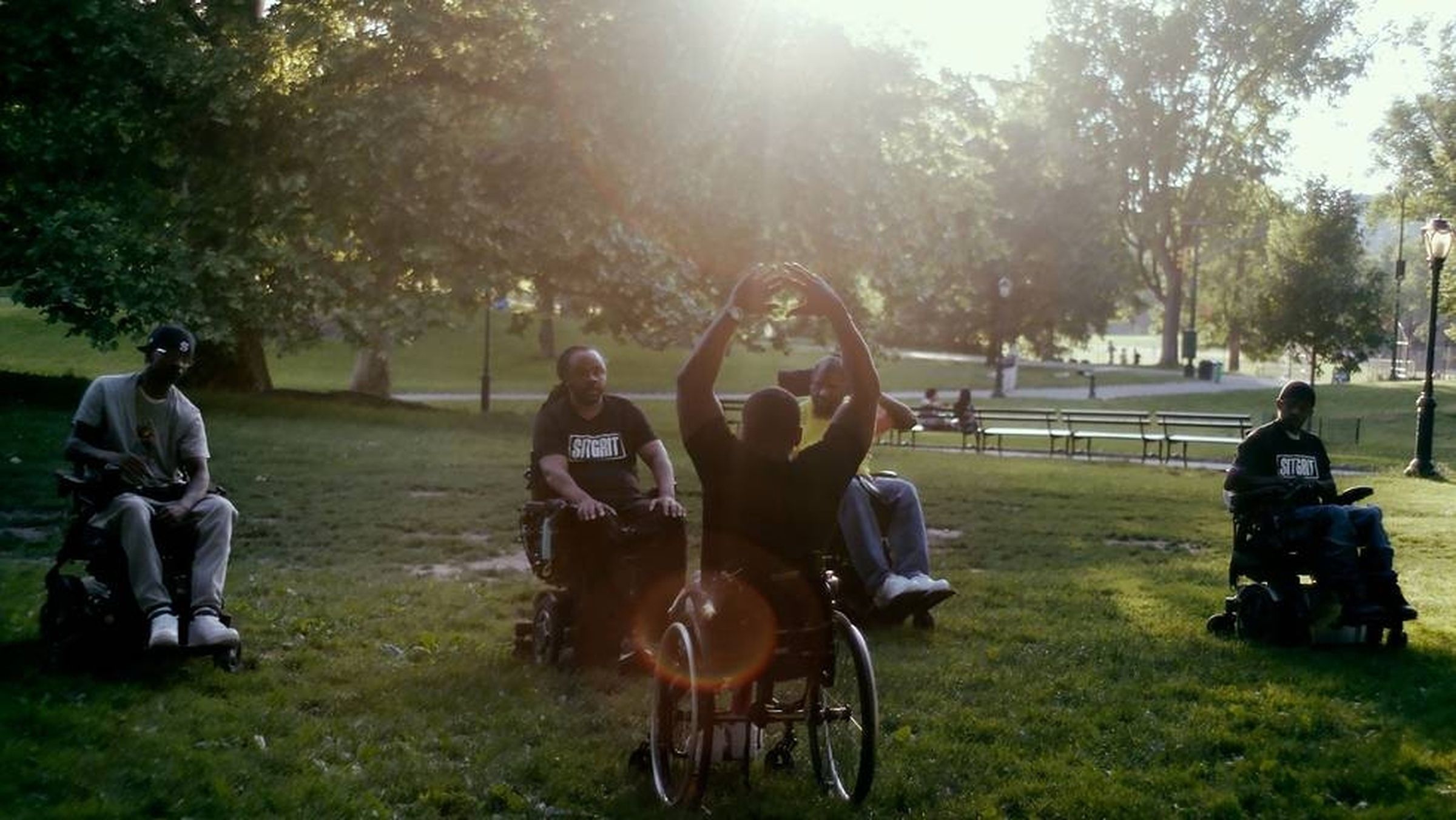 A still from Quad Gods of Prentice Hall, Richard Jacobs, Alejandro Courtney, Blake Hunt exercising in Central Park