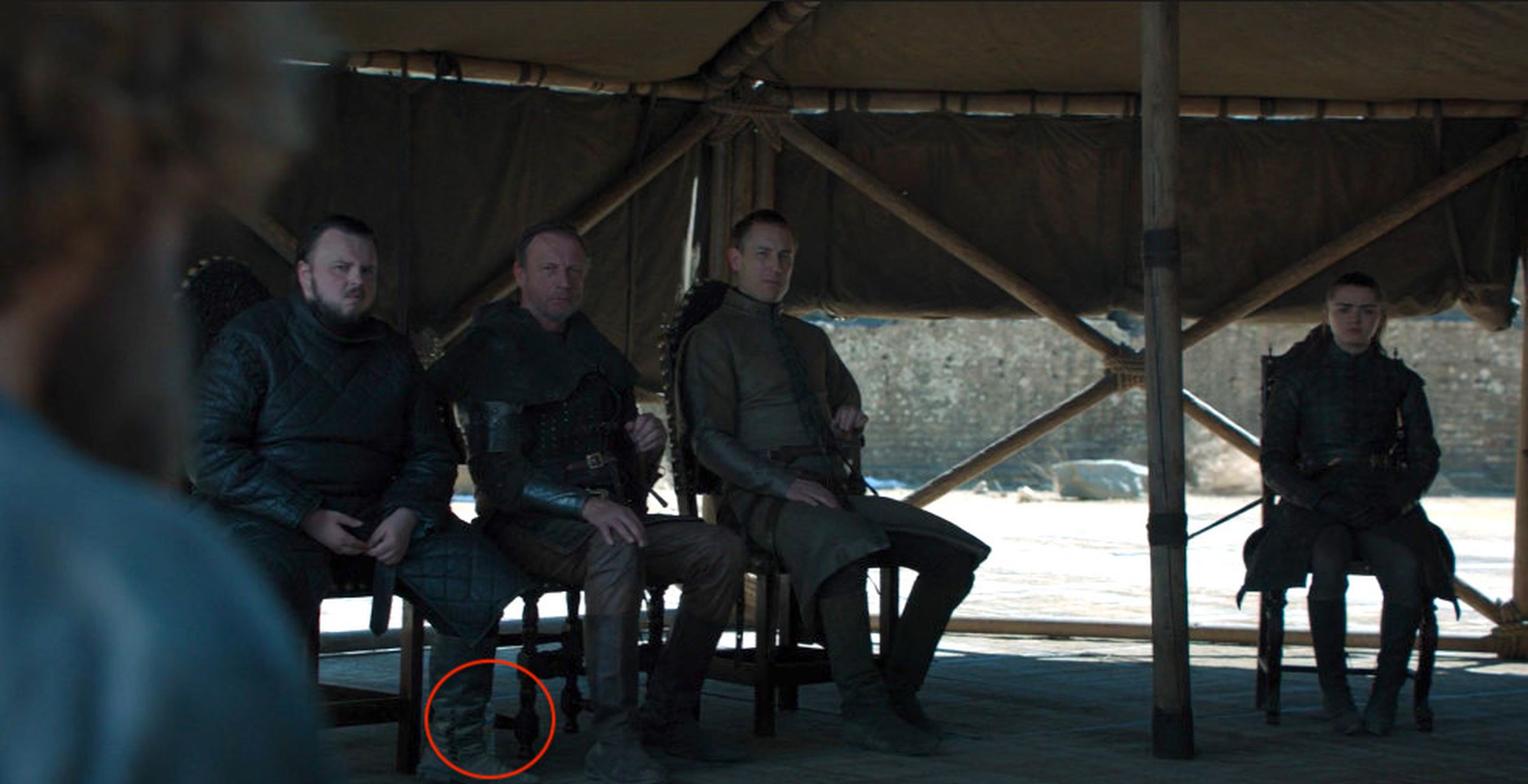 The water bottle is just behind Samwell Tarly’s foot above.