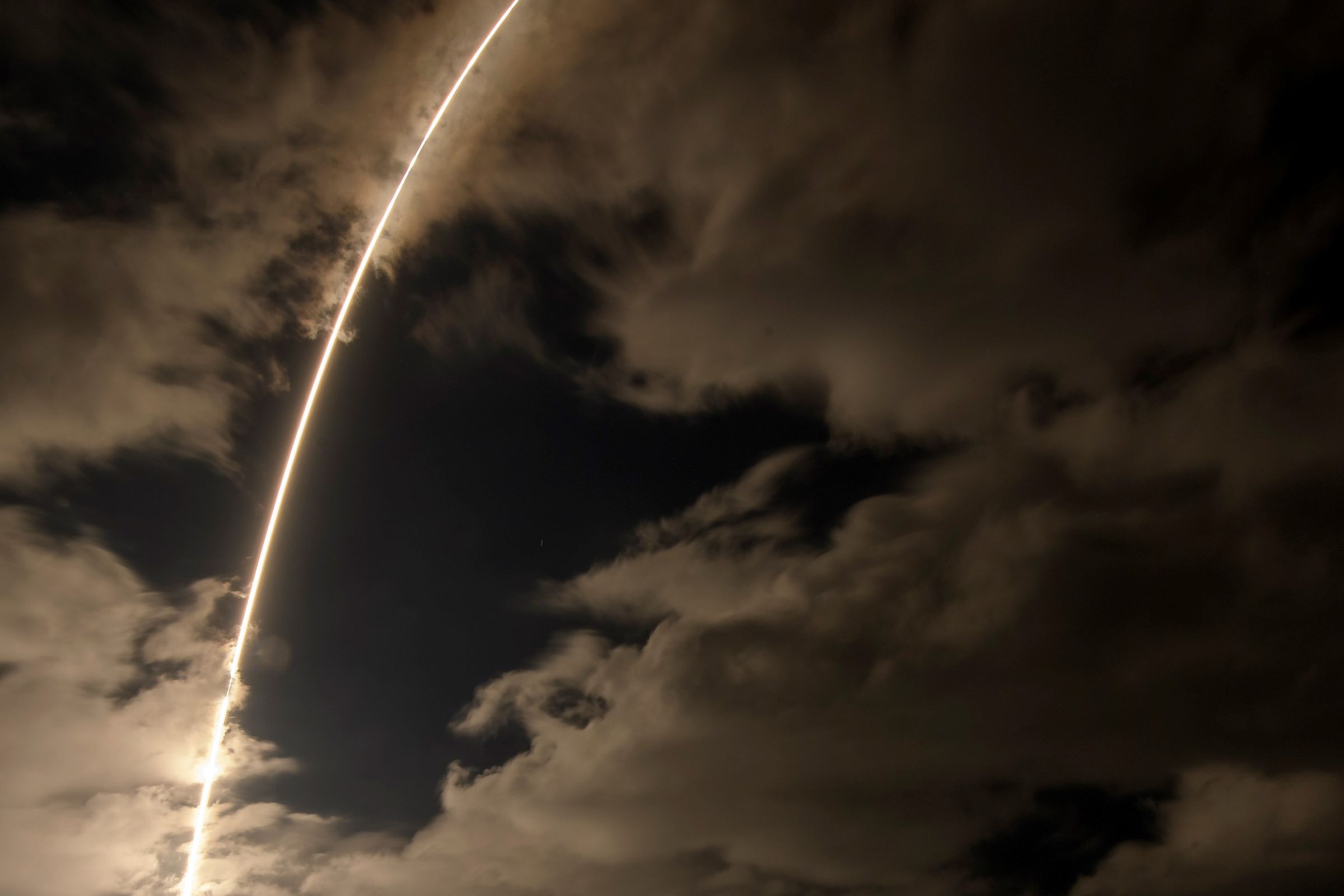 A United Launch Alliance Atlas V rocket with the Lucy spacecraft aboard is seen in this 2 minute and 30 second exposure photograph as it launches from Space Launch Complex 41, Saturday, Oct. 16, 2021, at Cape Canaveral Space Force Station in Florida.