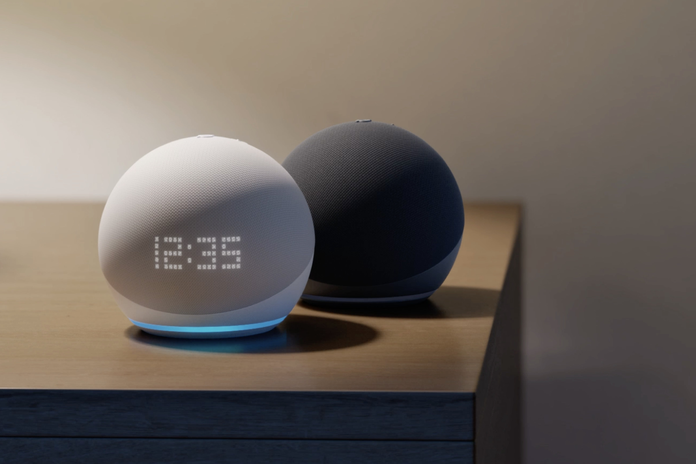 Two smart speakers on a table