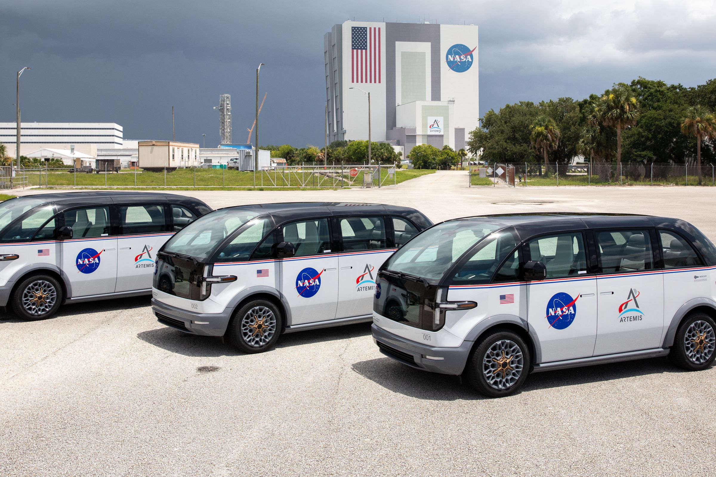 With the Vehicle Assembly Building in the background, the three specially designed, fully electric, environmentally friendly crew transportation vehicles for Artemis missions arrived at NASA’s Kennedy Space Center in Florida on July 11th, 2023.