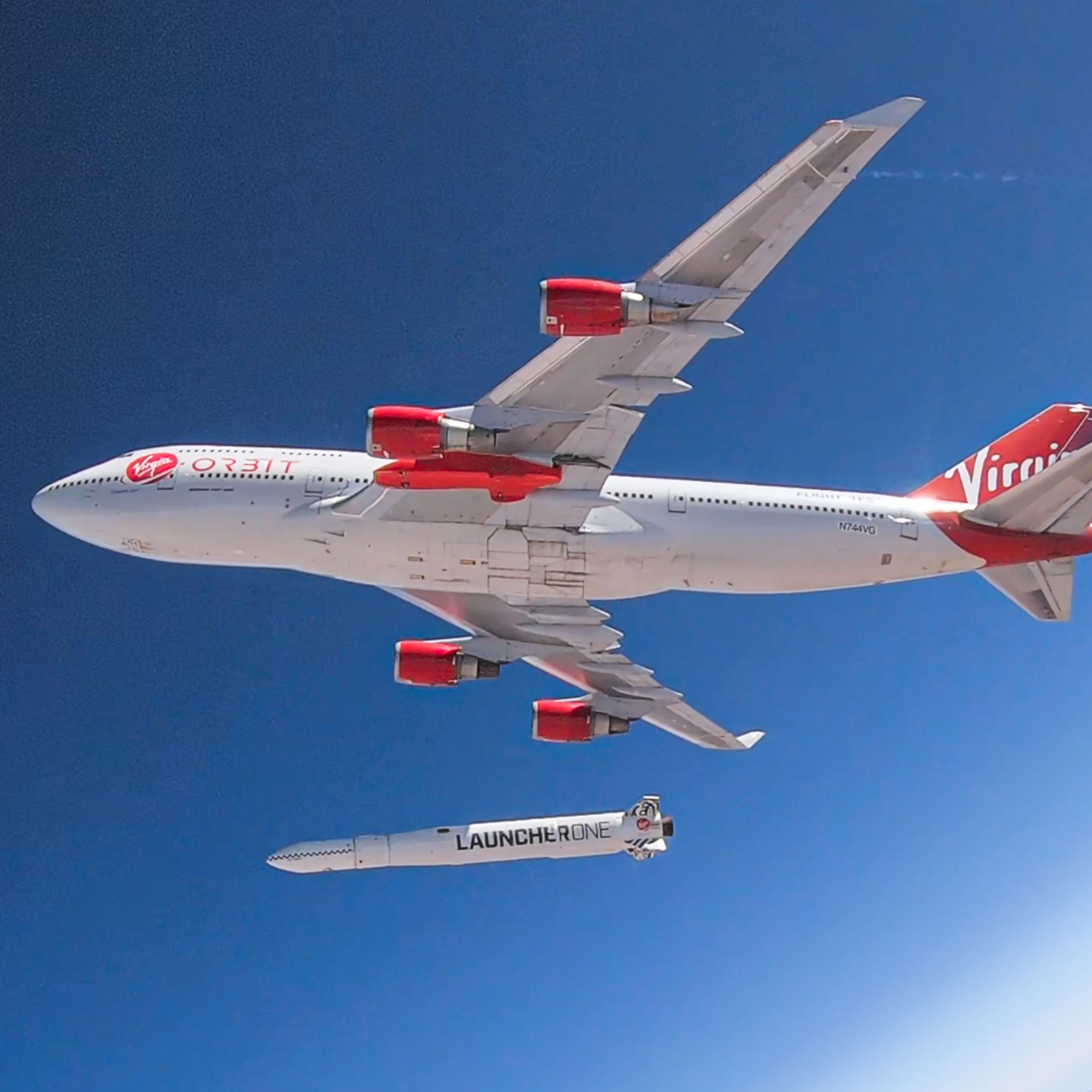 Virgin Orbit’s Cosmic Girl Boeing 747 midflight, releasing the LauncherOne rocket.