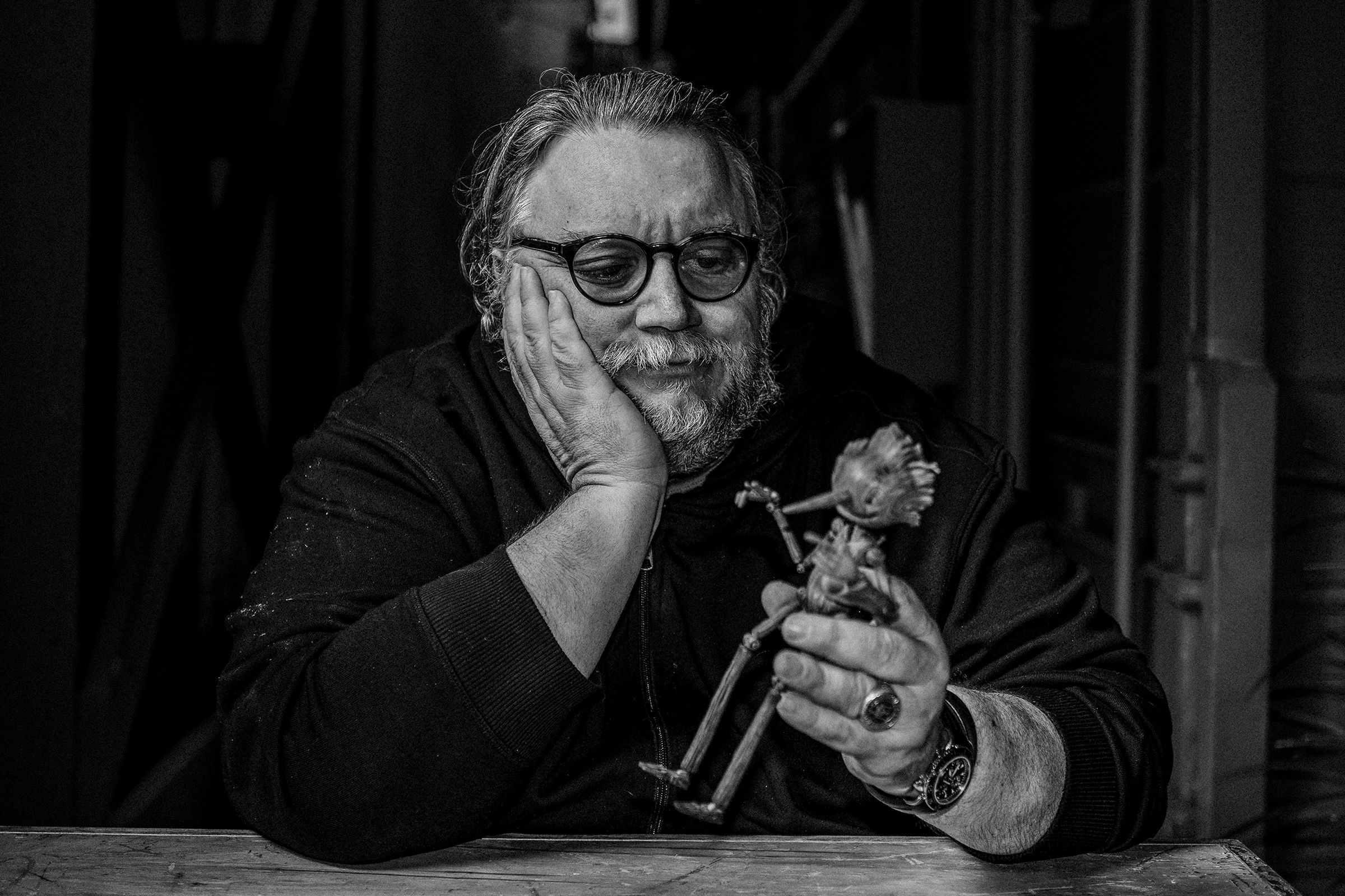 Director Guillermo del Toro and a model of his new take on Pinocchio.